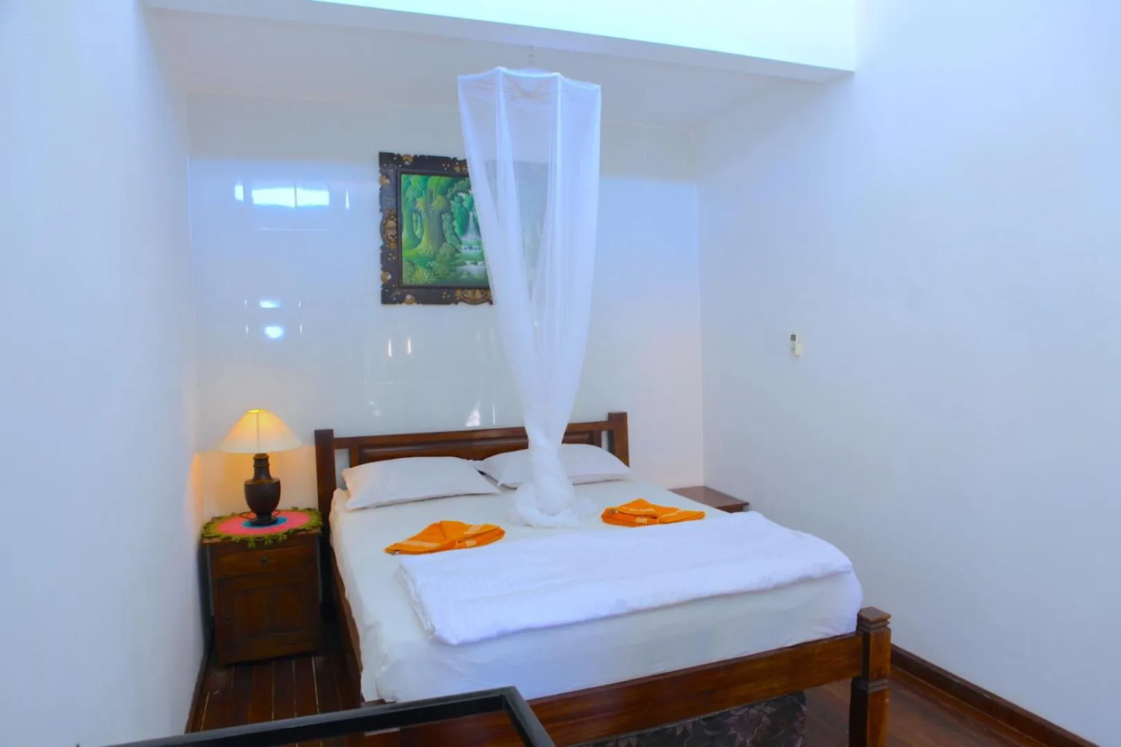Bed in Tirta Yoga Inn