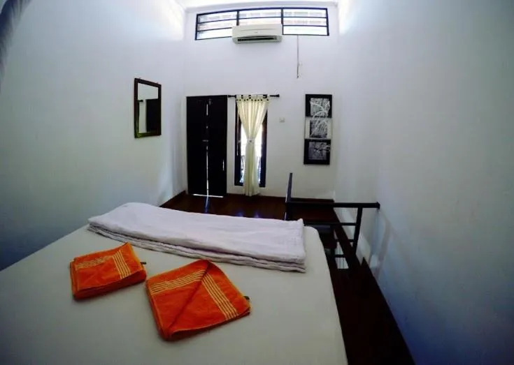 Bed in Tirta Yoga Inn