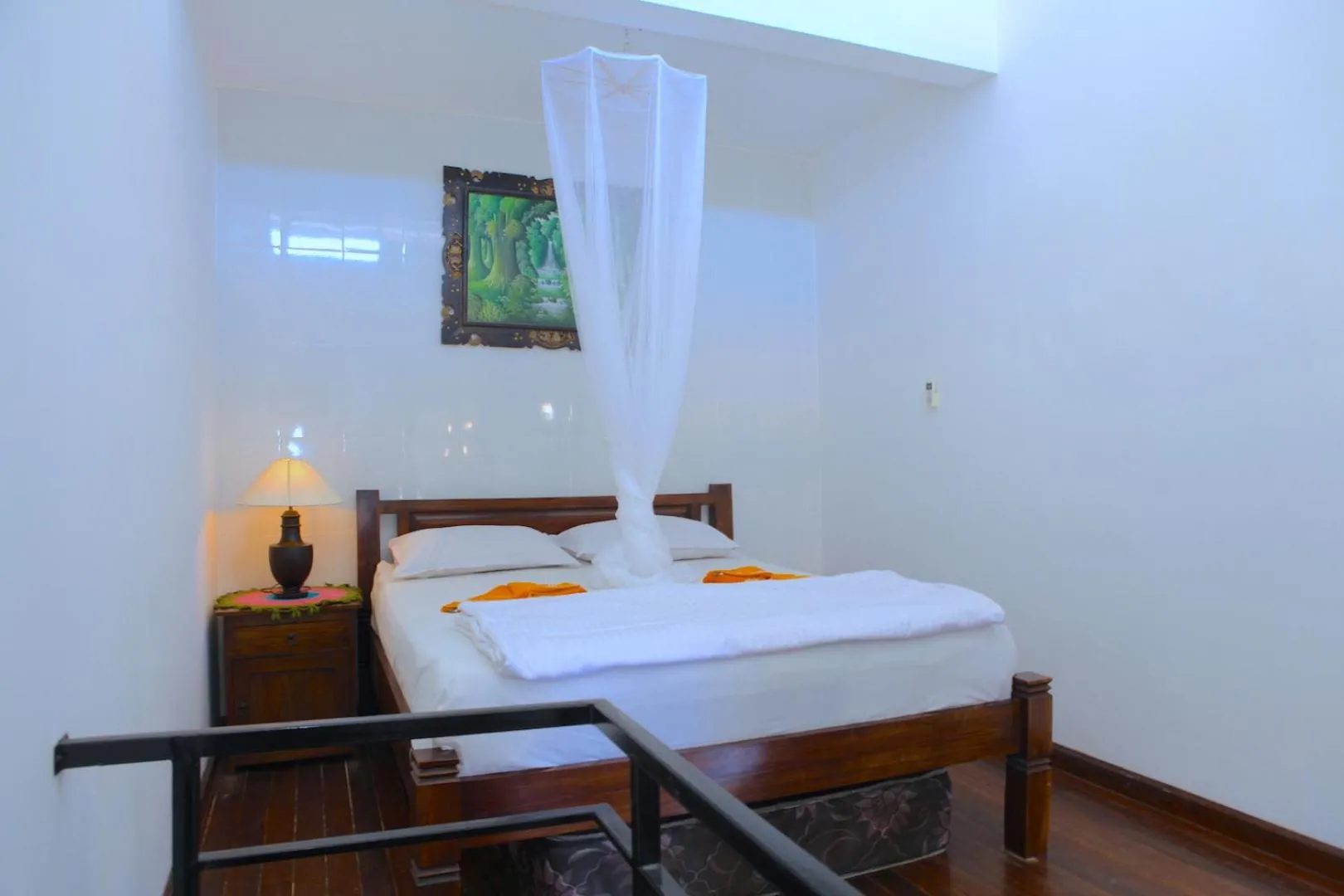 Bed in Tirta Yoga Inn