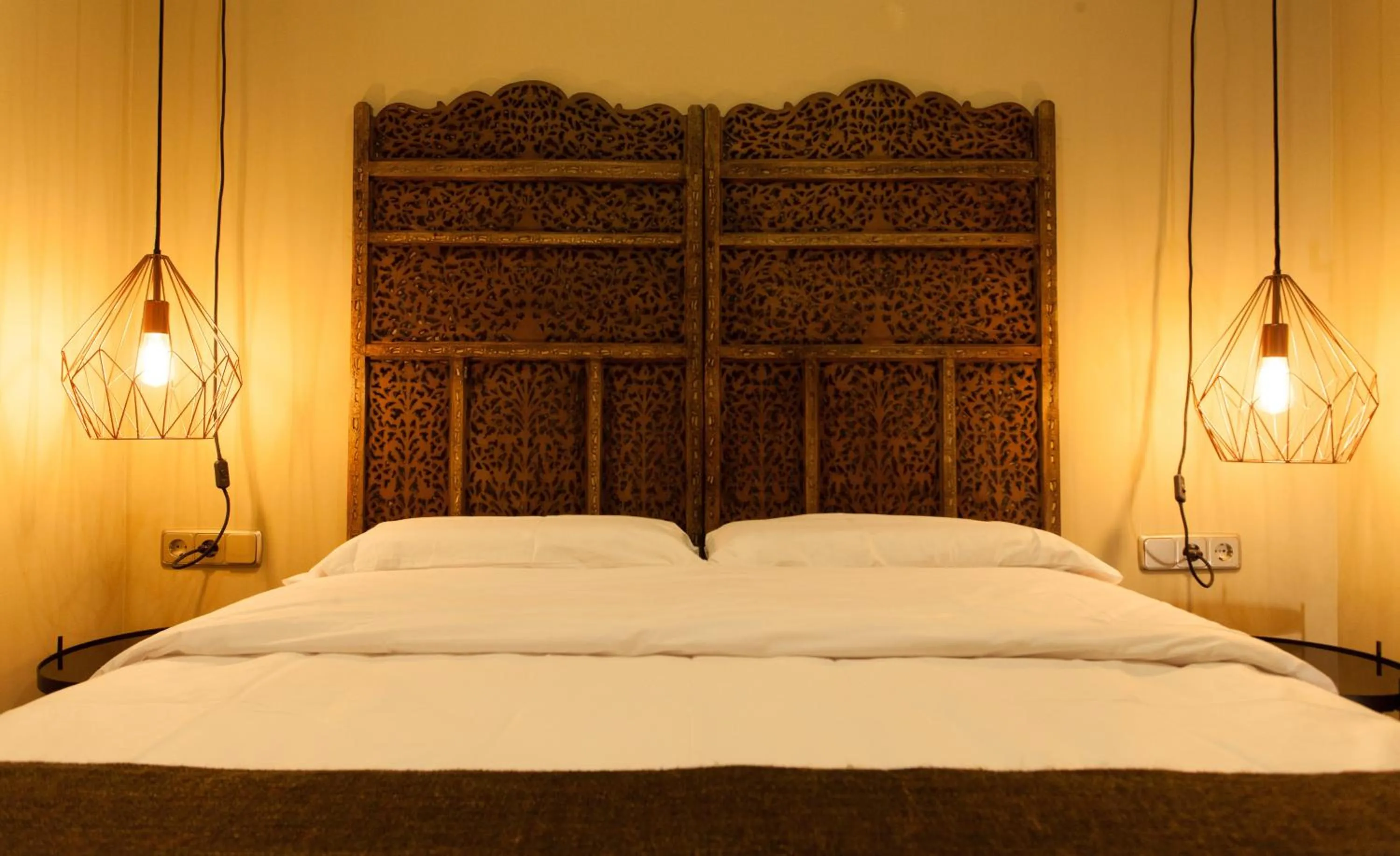 Photo of the whole room, Bed in AbraCadabra Suites