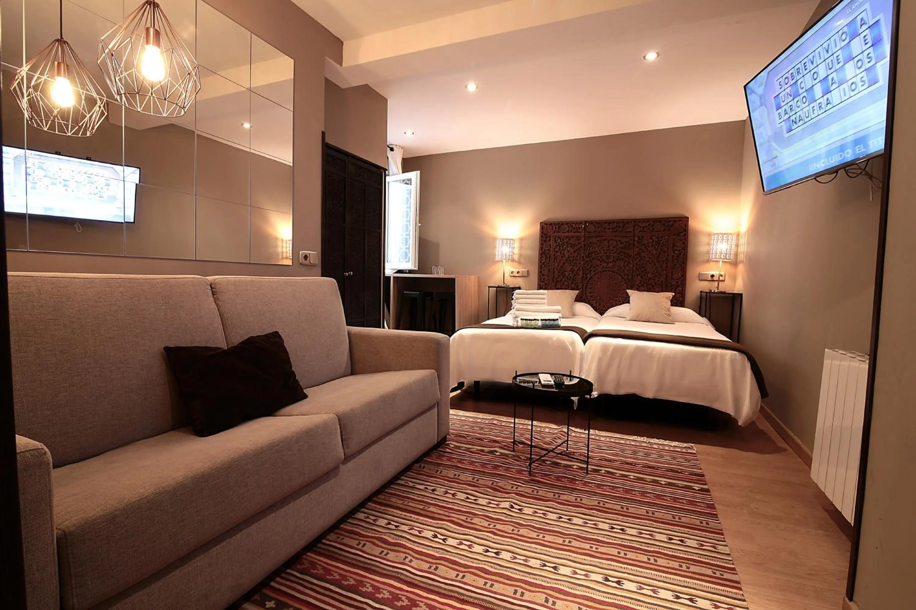 Photo of the whole room, Bed in AbraCadabra Suites