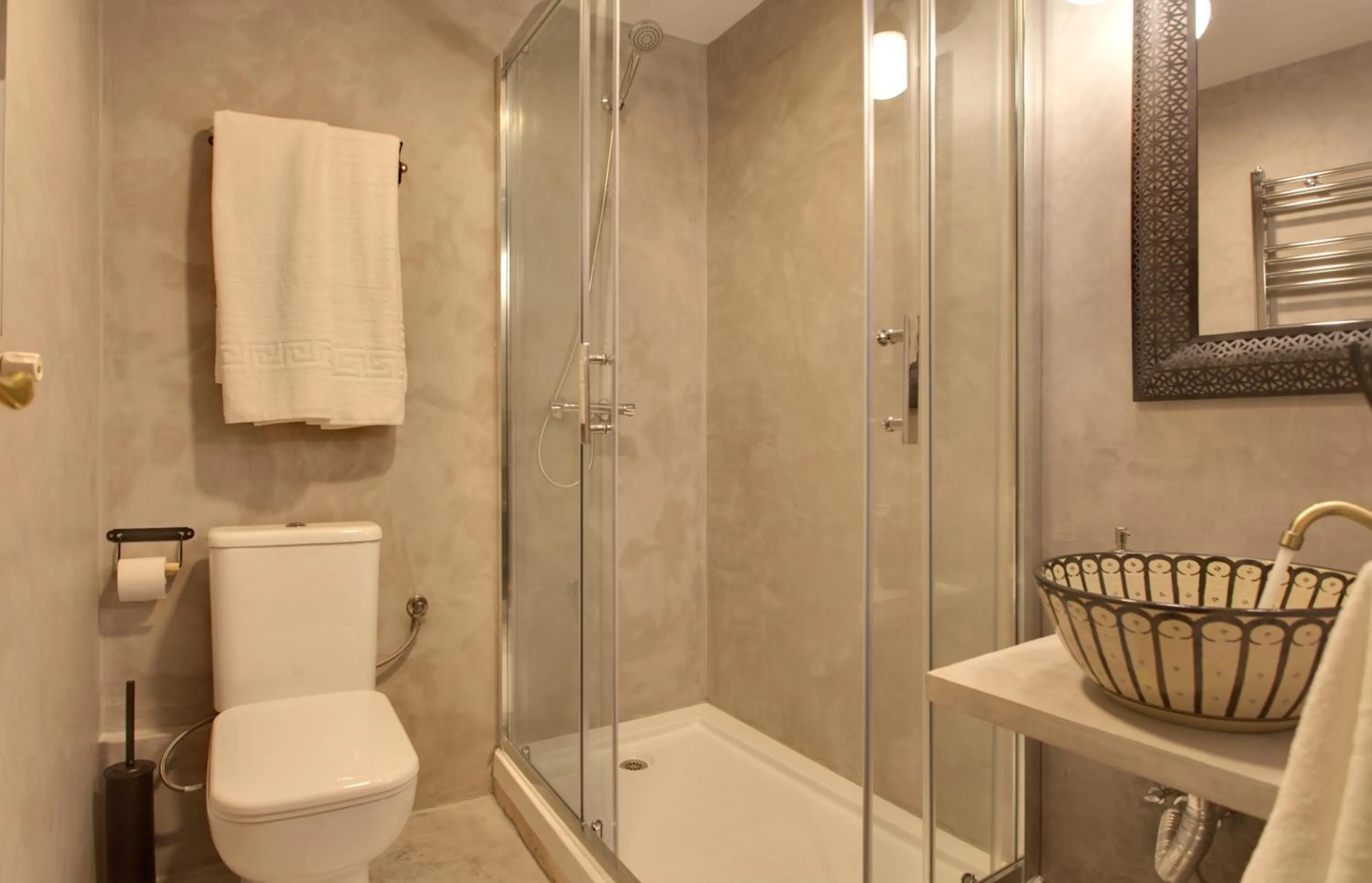 Toilet in AbraCadabra Suites