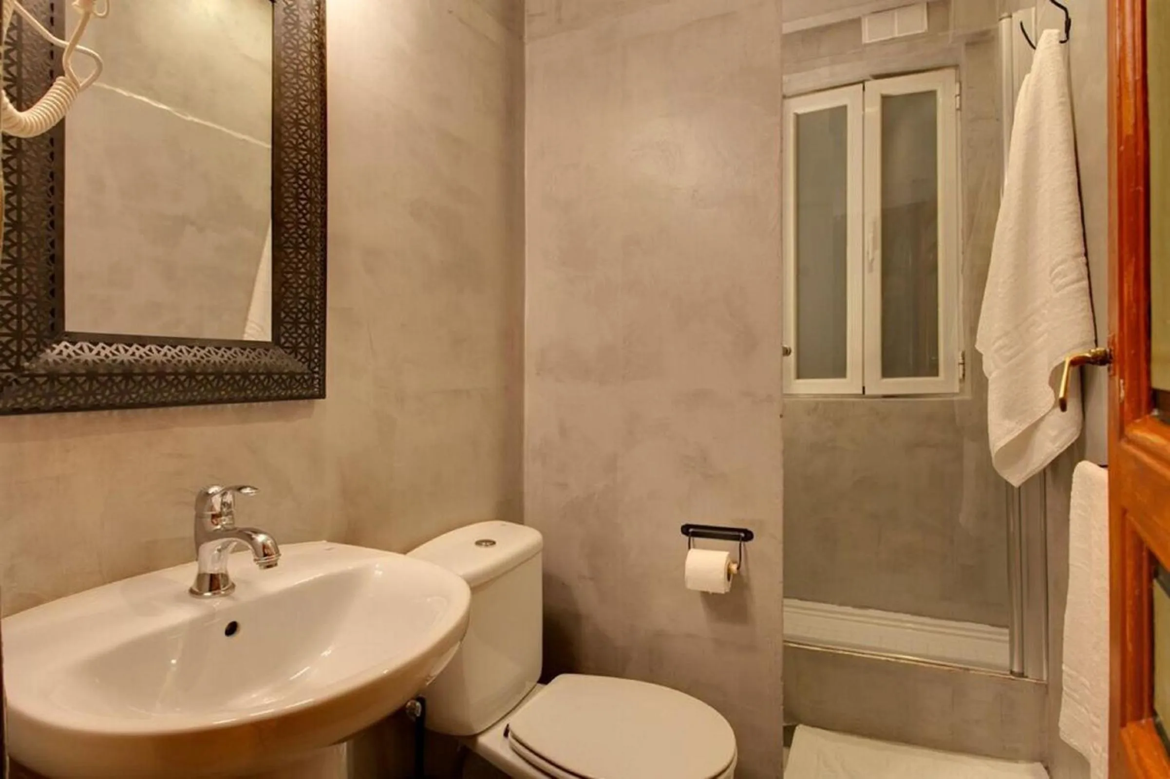 Bathroom in AbraCadabra Suites