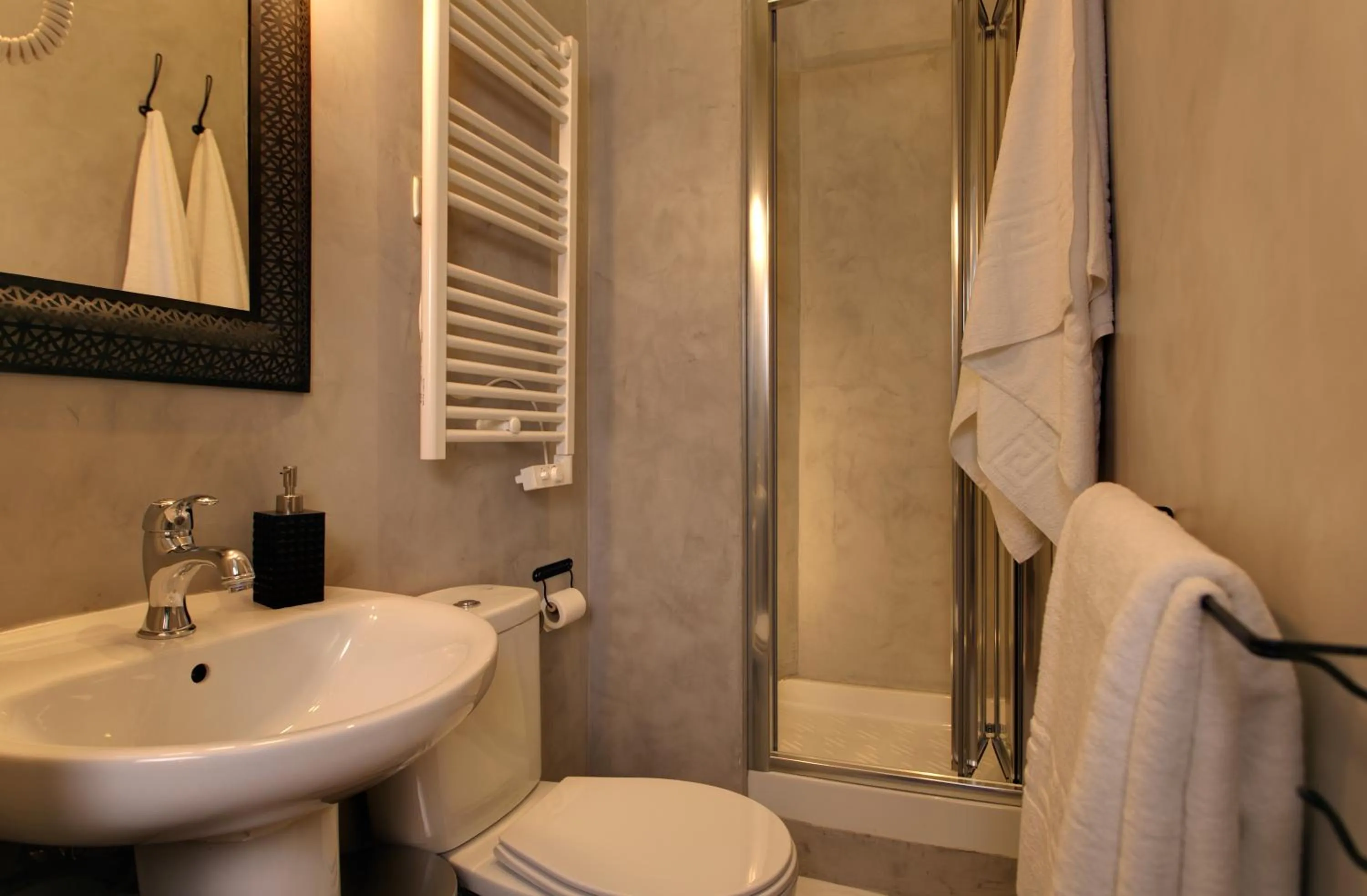 Bathroom in AbraCadabra Suites