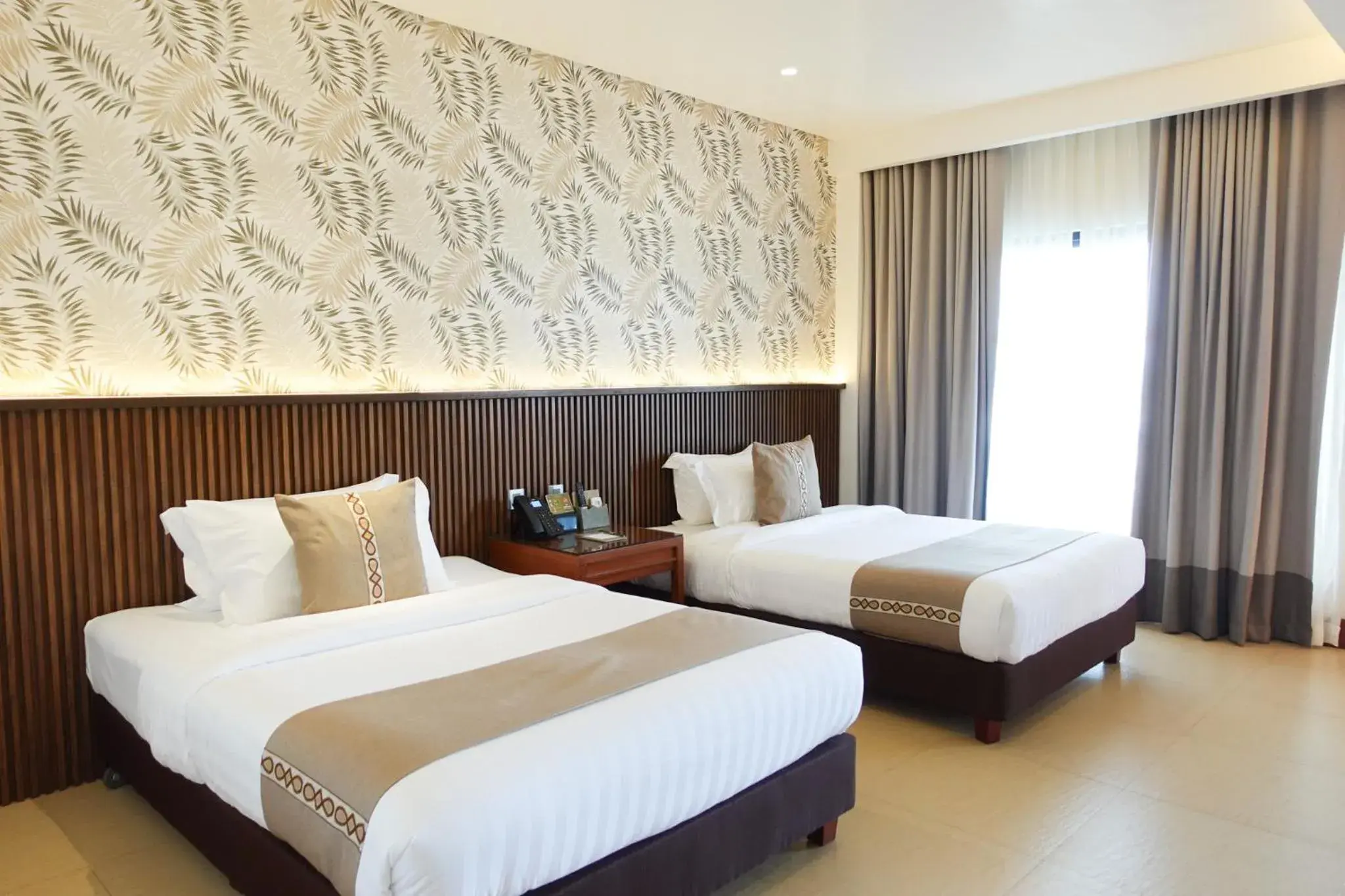 Twin Room with Sea View in The Tropics at MacArthur Park Resort and Convention Center Twin Room with Sea View in The Tropics at MacArthur Park Resort and Convention Center