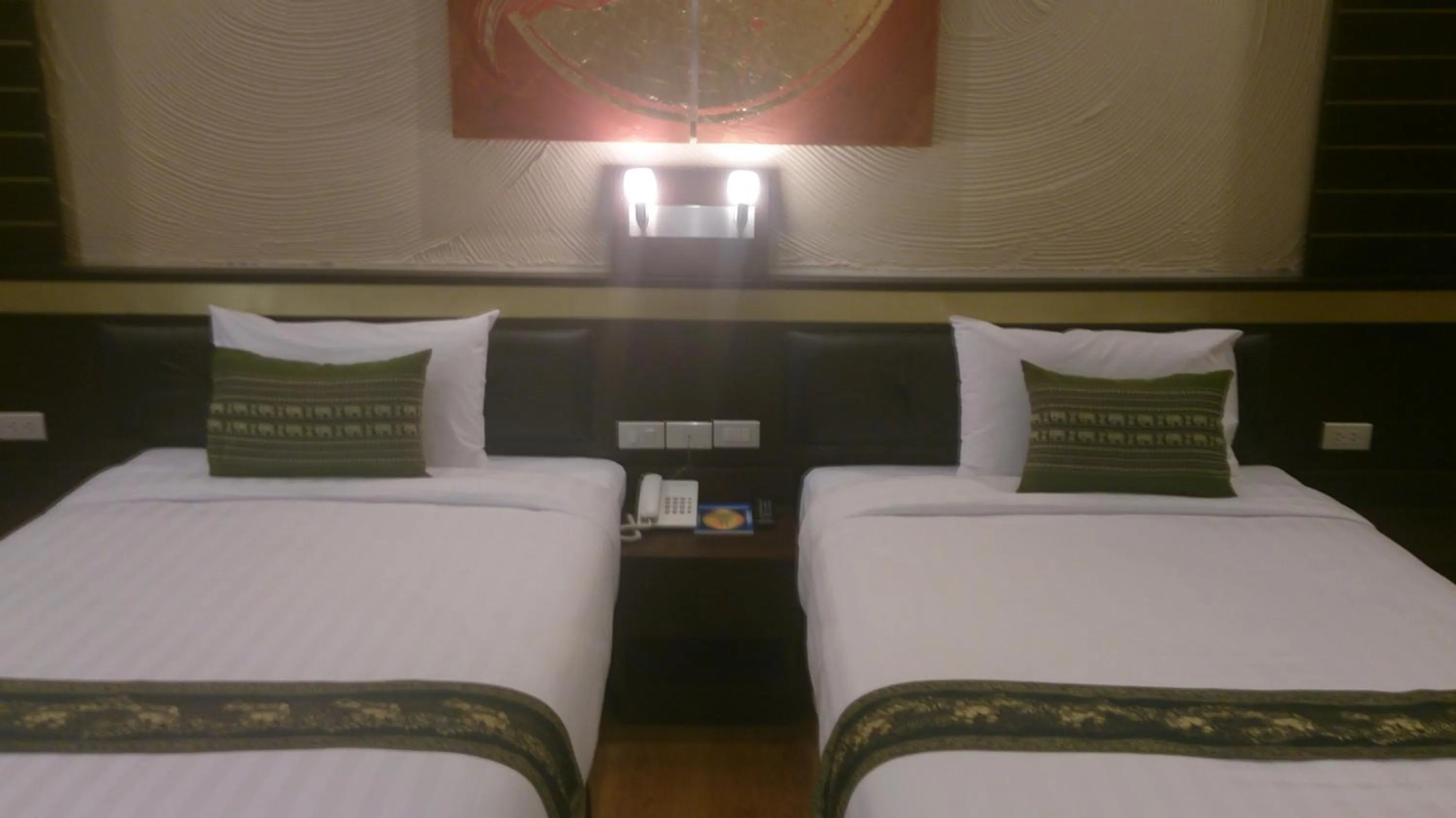 Bed in Phurua Sanctuary Resort and Spa