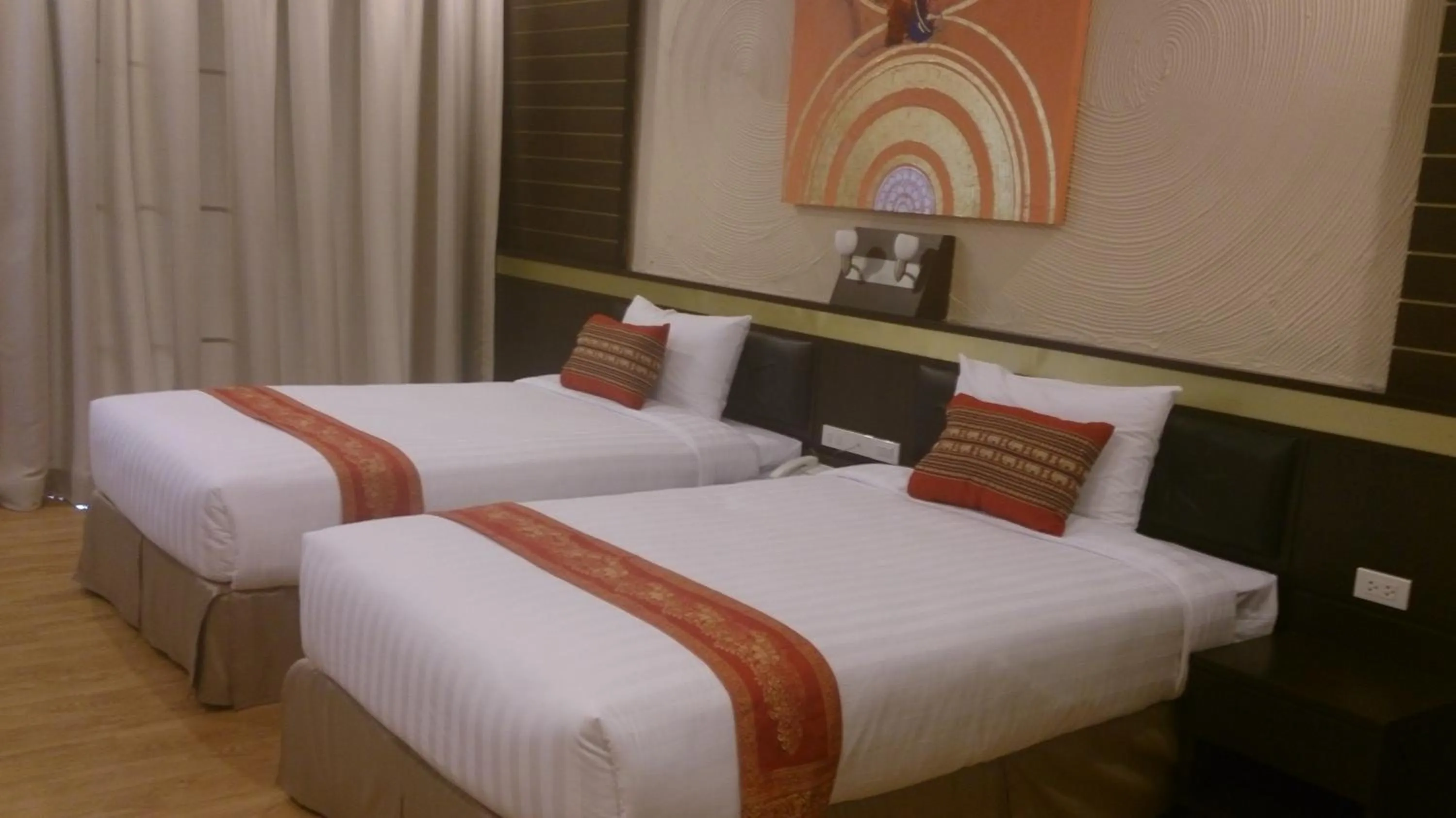 Bed in Phurua Sanctuary Resort and Spa
