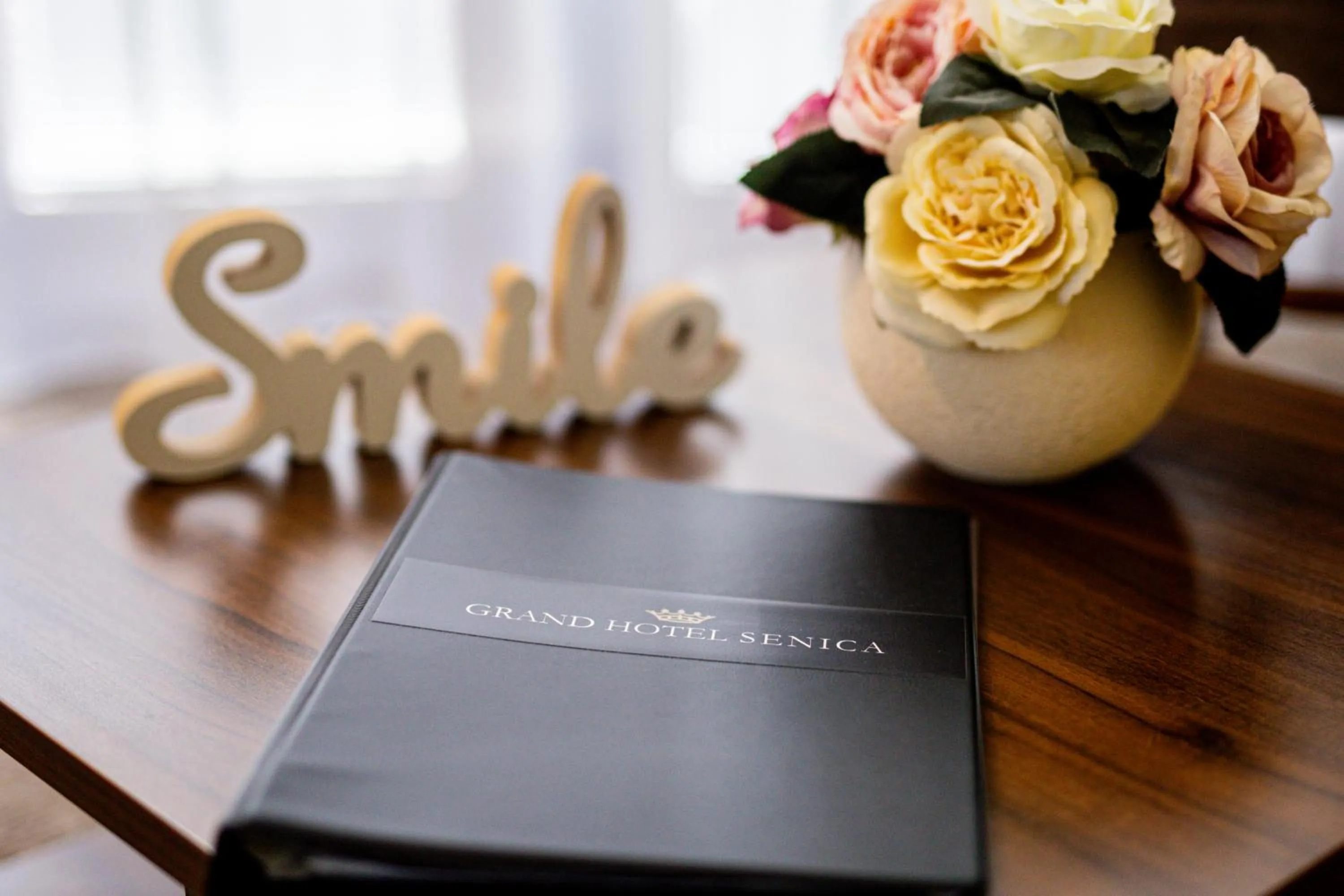 Text overlay in Grand Hotel Senica, Garni