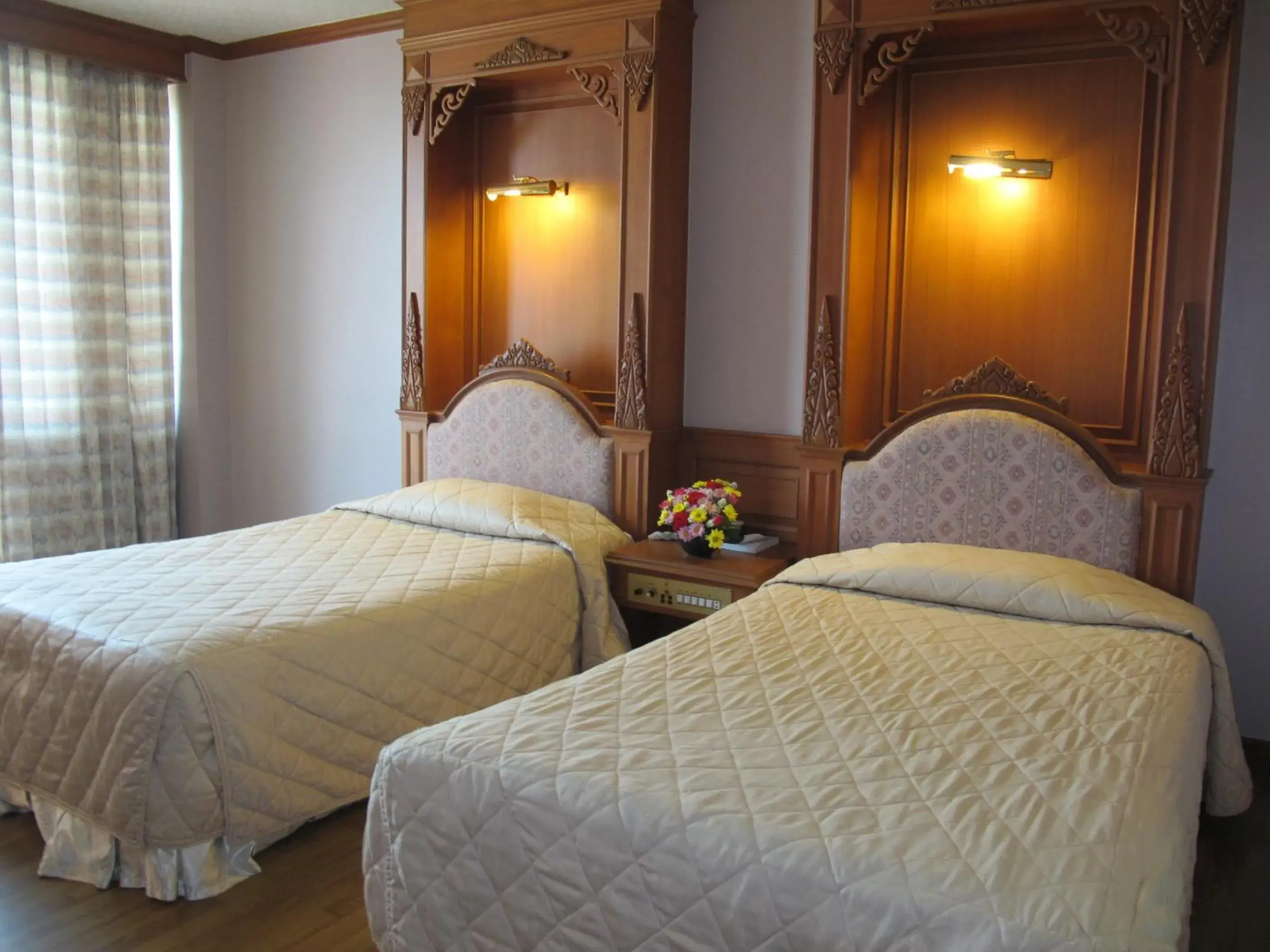 Bed in Rimpao Hotel Bed in Rimpao Hotel