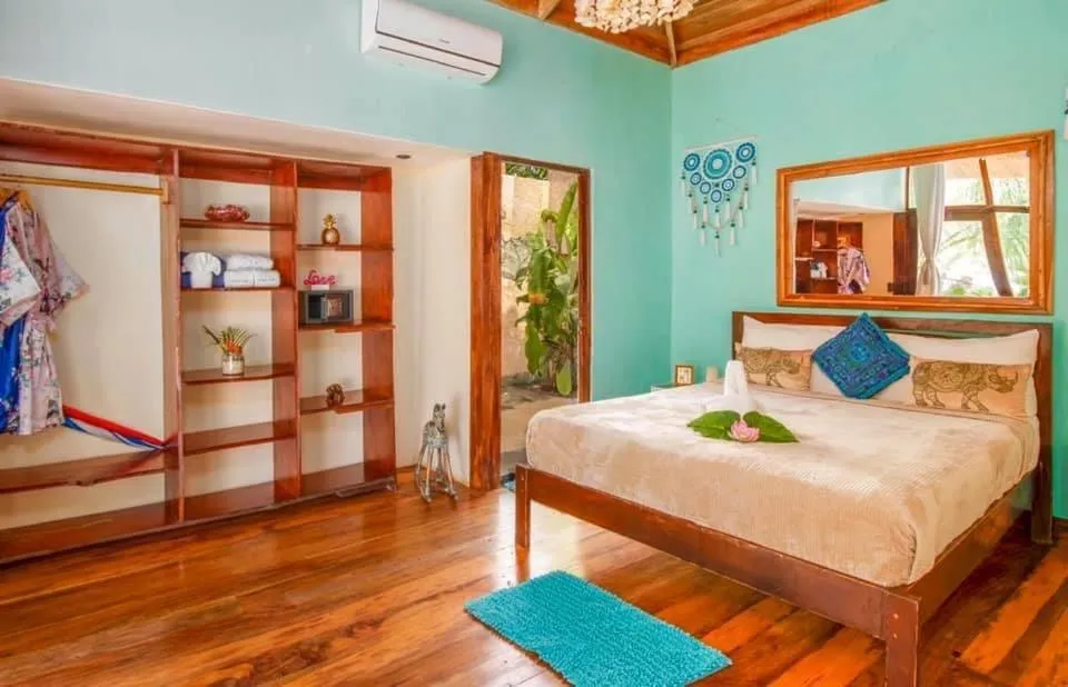Bed in Ocho Artisan Bungalows
