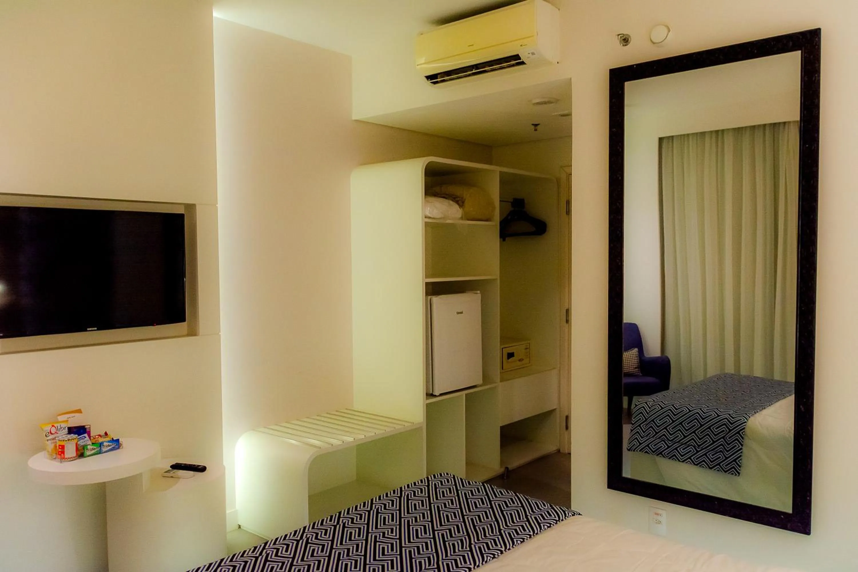 Bed in Golden Tower Shopping by Fênix Hotéis