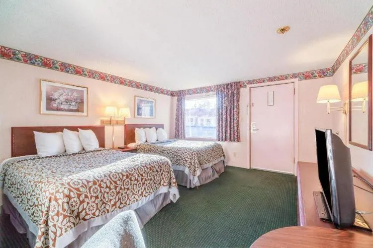 Bed in Ozark Junction Inn