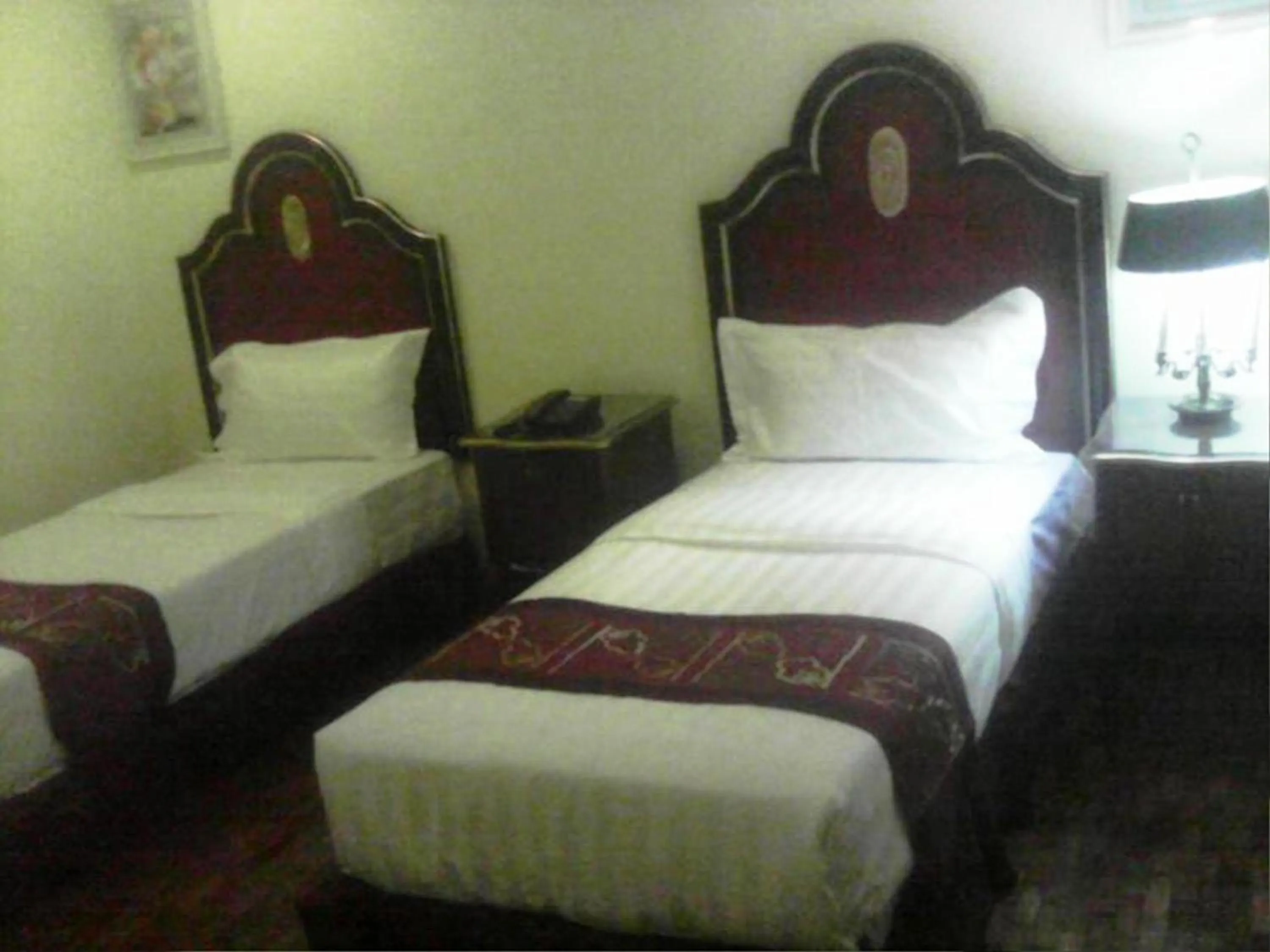Bed in Rainbowland Hotel