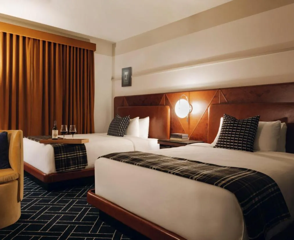 Bed in Caravan Court Hotel