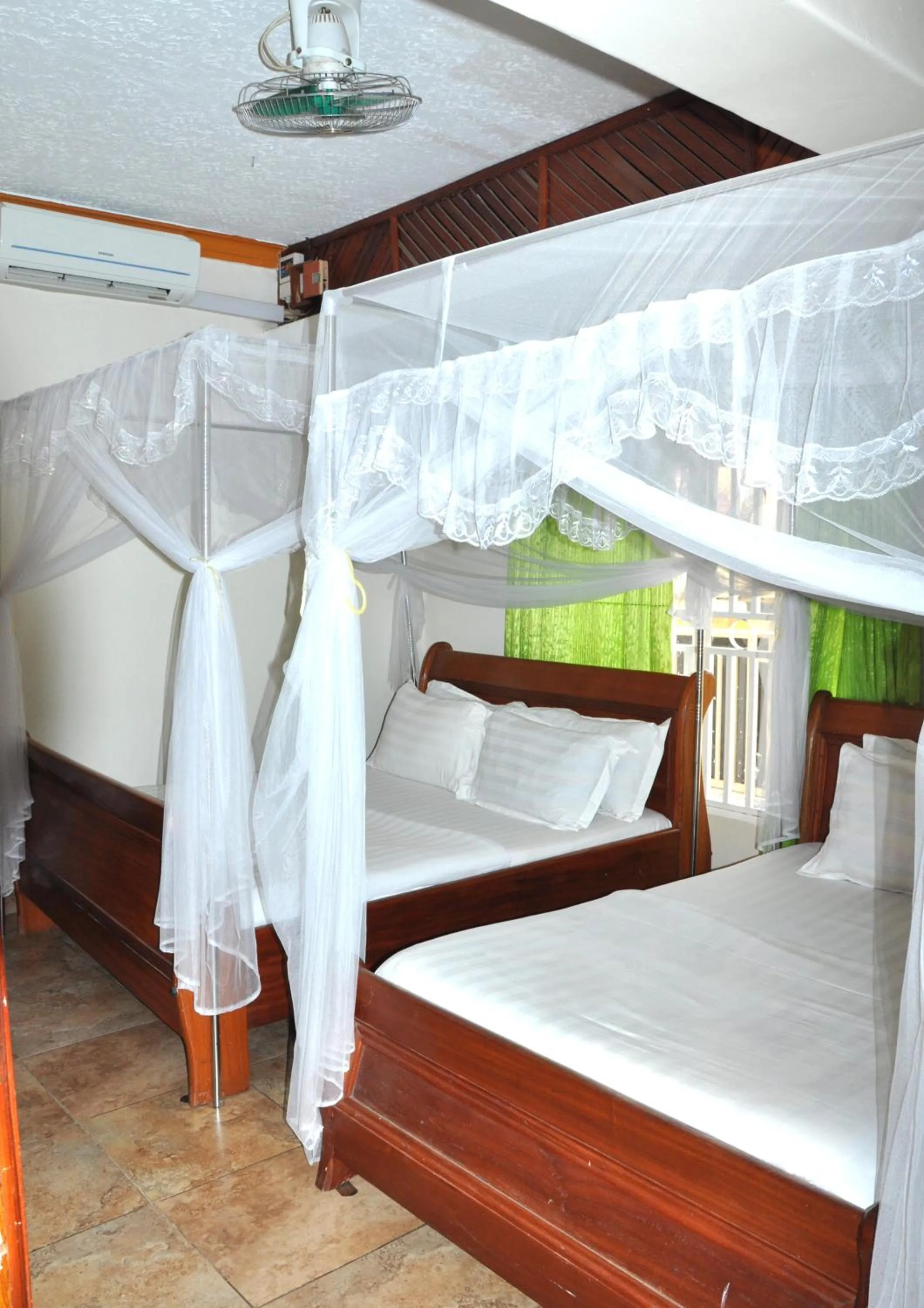 Photo of the whole room, Bed in Sandton Hotel Kasese