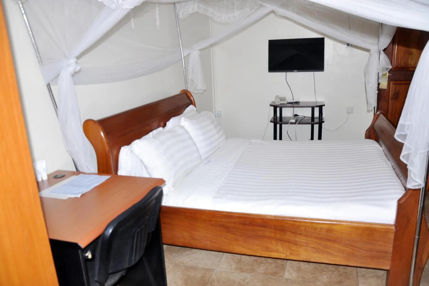 Bed in Sandton Hotel Kasese