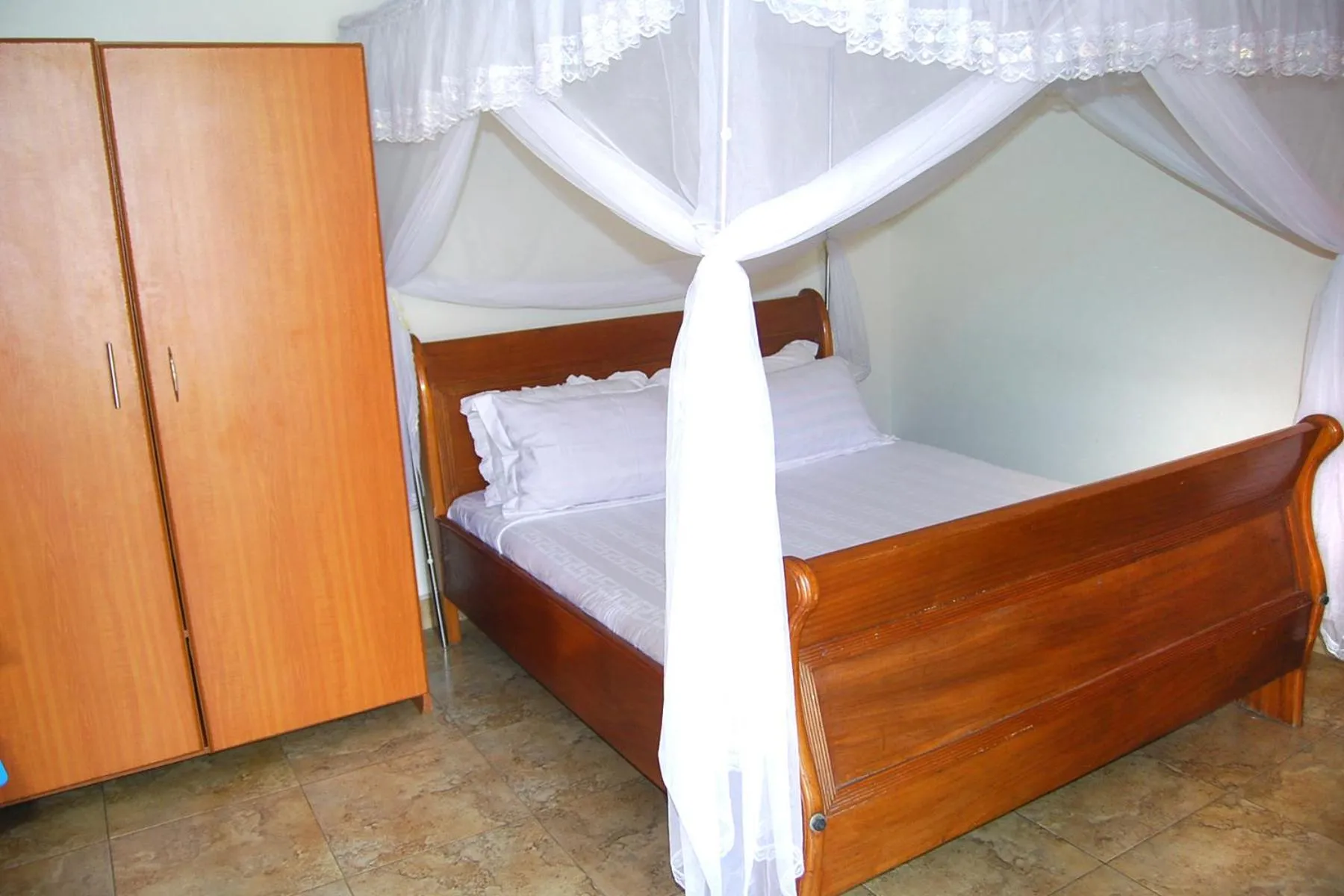 Bed in Sandton Hotel Kasese