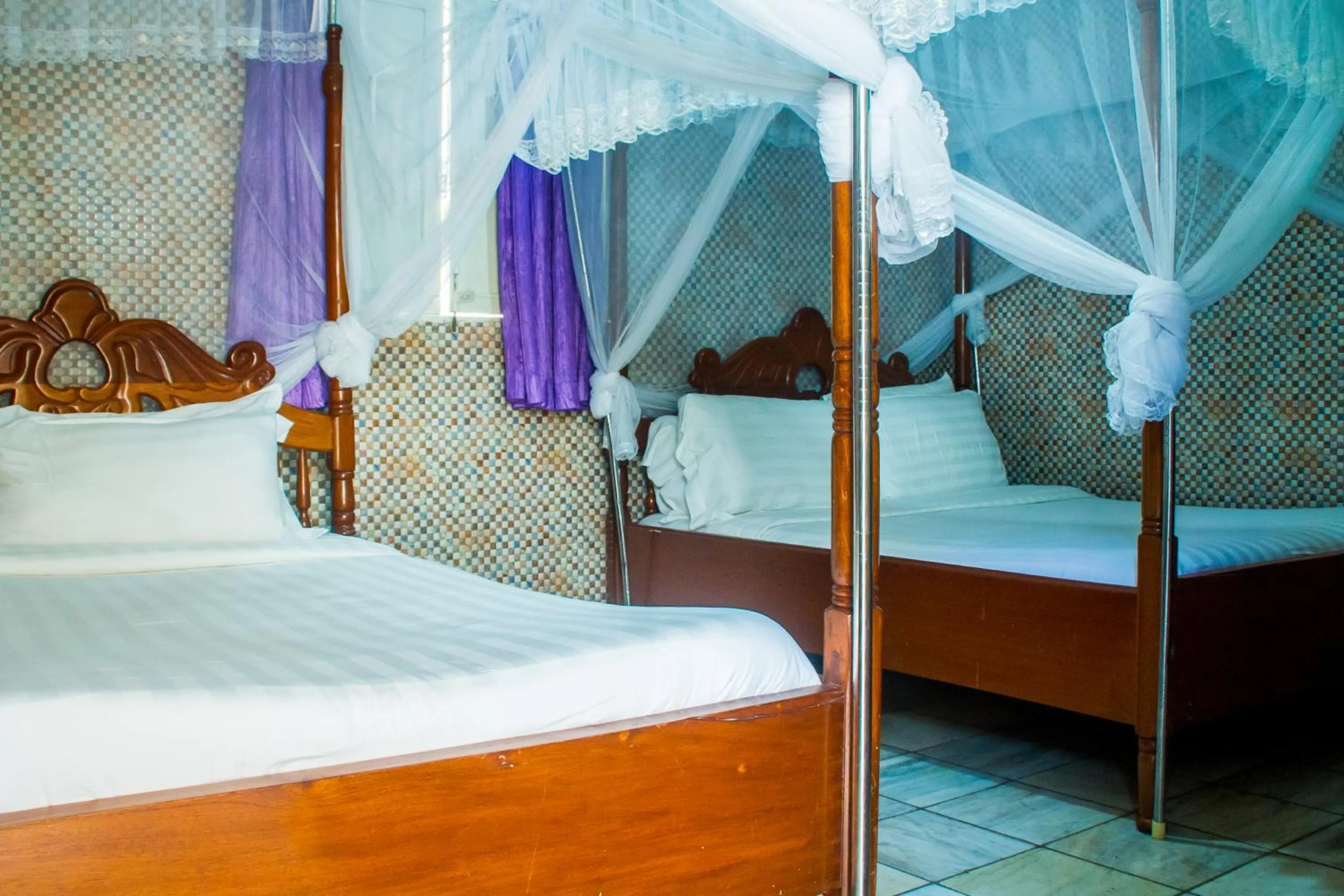 Photo of the whole room, Bed in Sandton Hotel Kasese