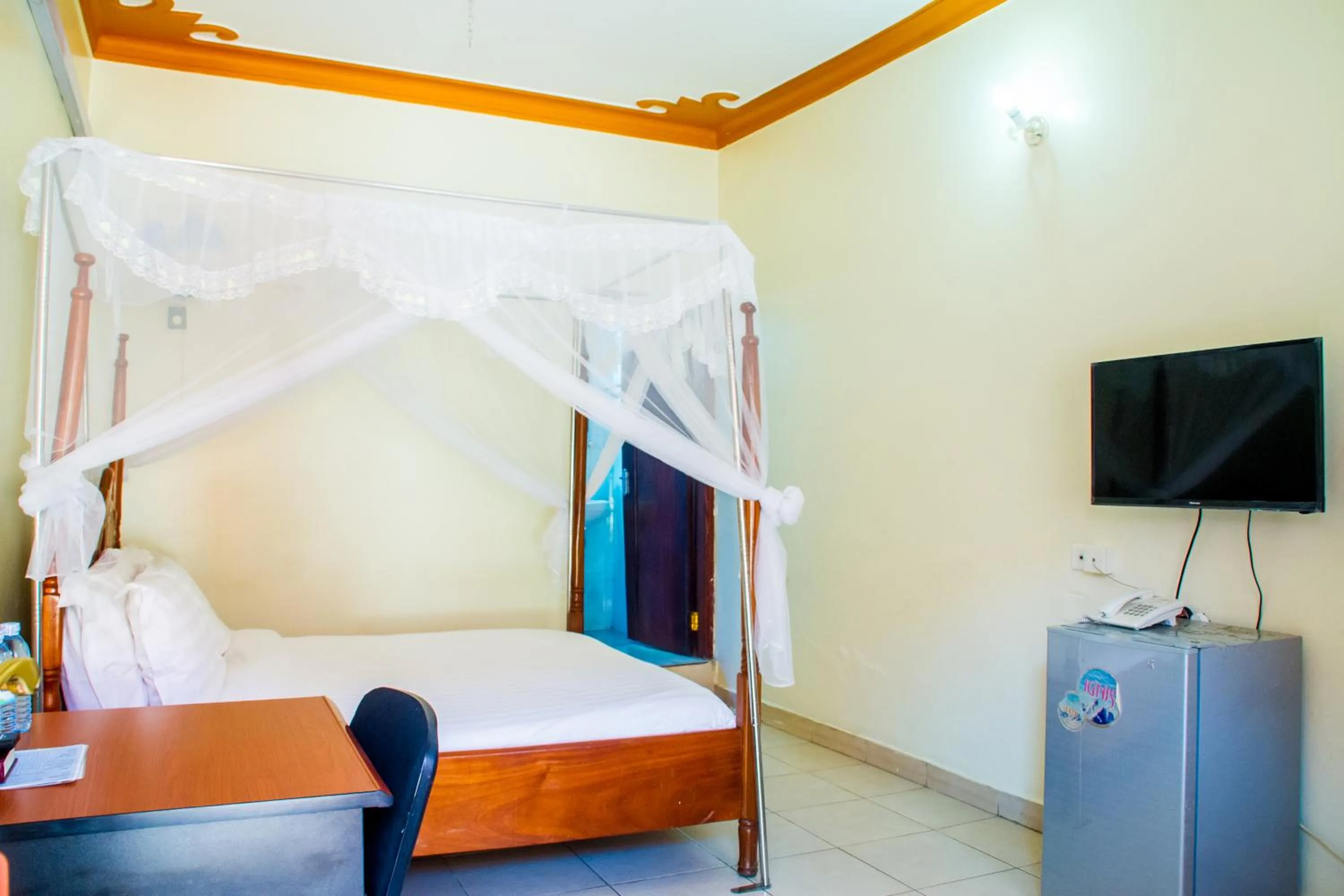 Photo of the whole room, Bed in Sandton Hotel Kasese