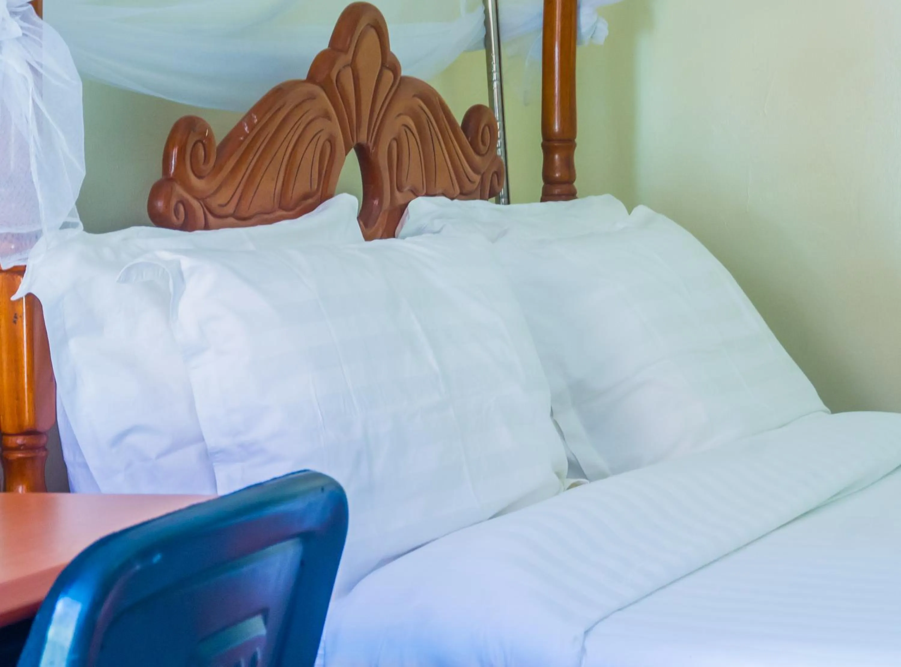 Bed in Sandton Hotel Kasese