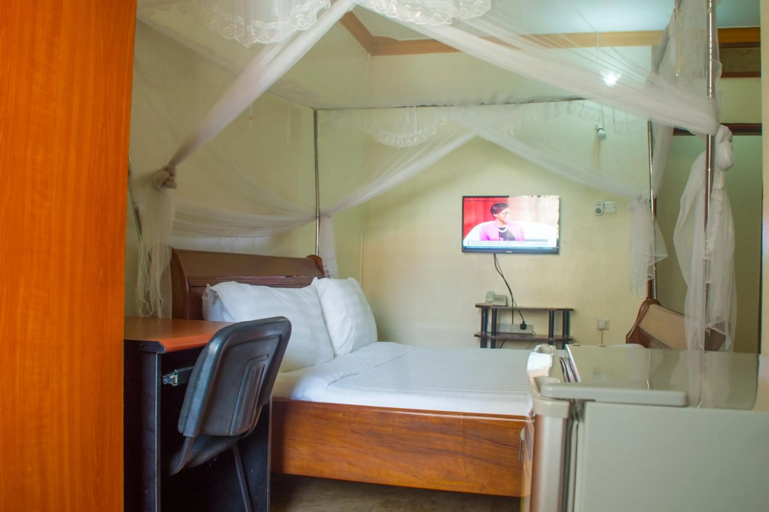 Photo of the whole room, Bed in Sandton Hotel Kasese