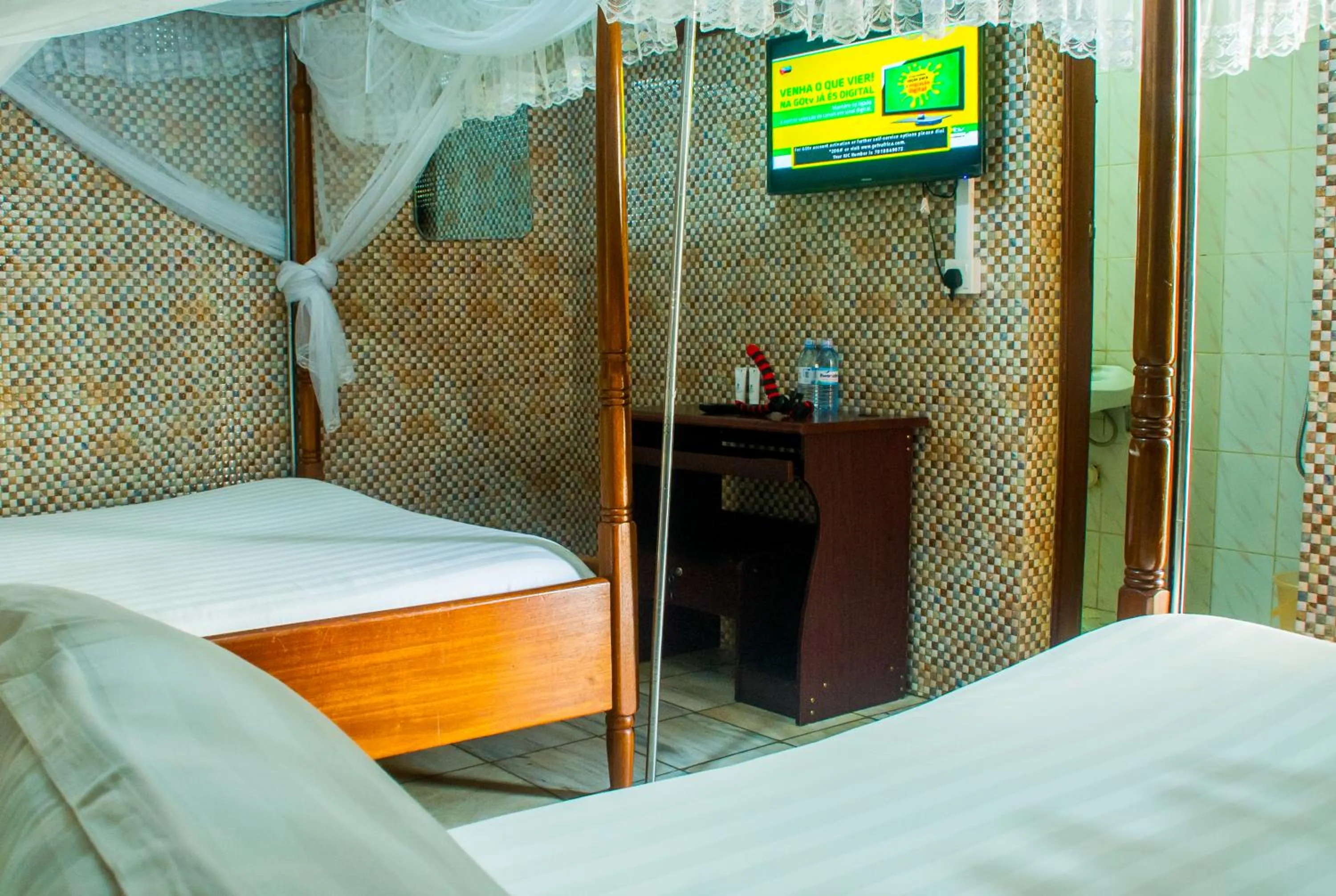Bedroom, Bed in Sandton Hotel Kasese
