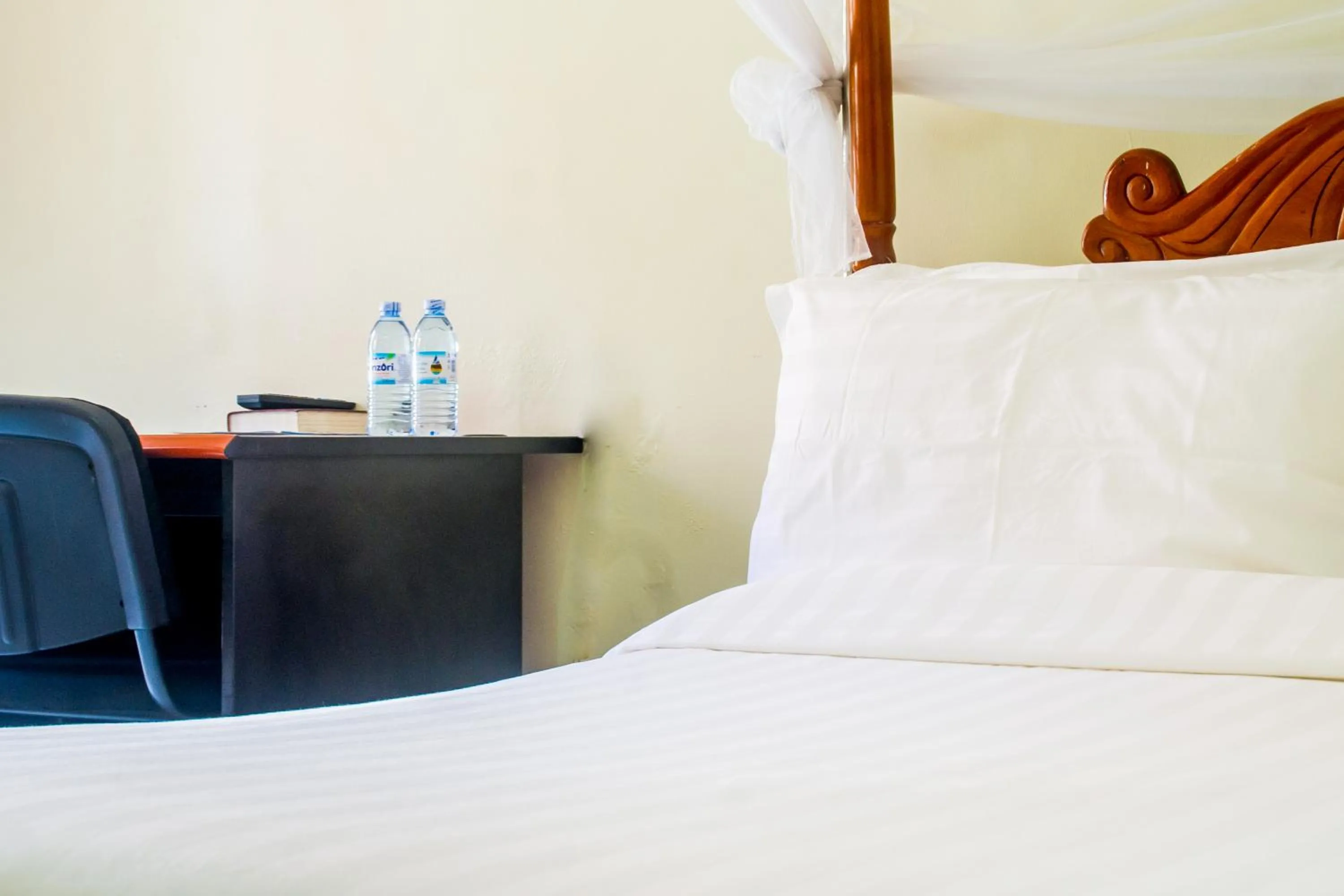 Photo of the whole room, Bed in Sandton Hotel Kasese