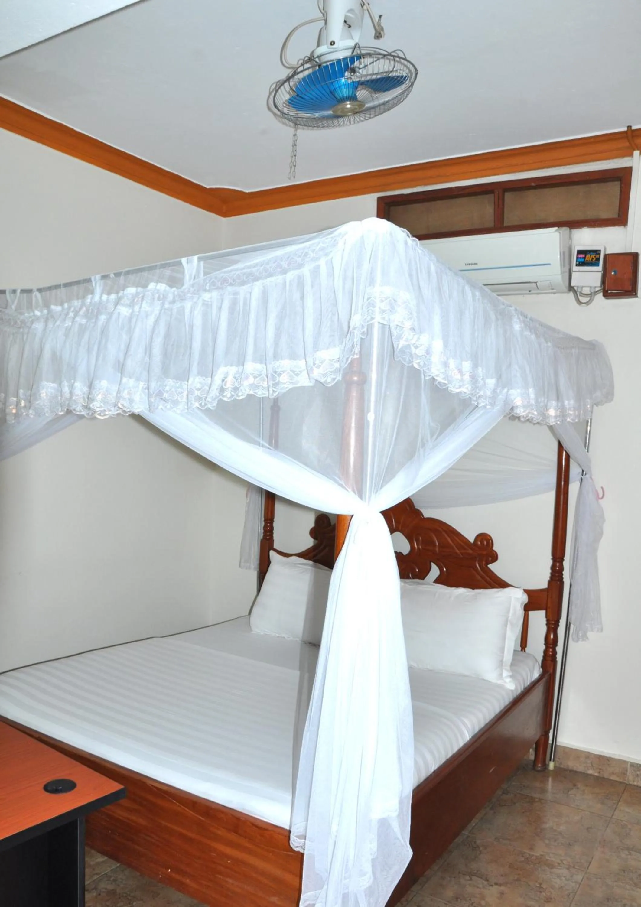 Photo of the whole room, Bed in Sandton Hotel Kasese
