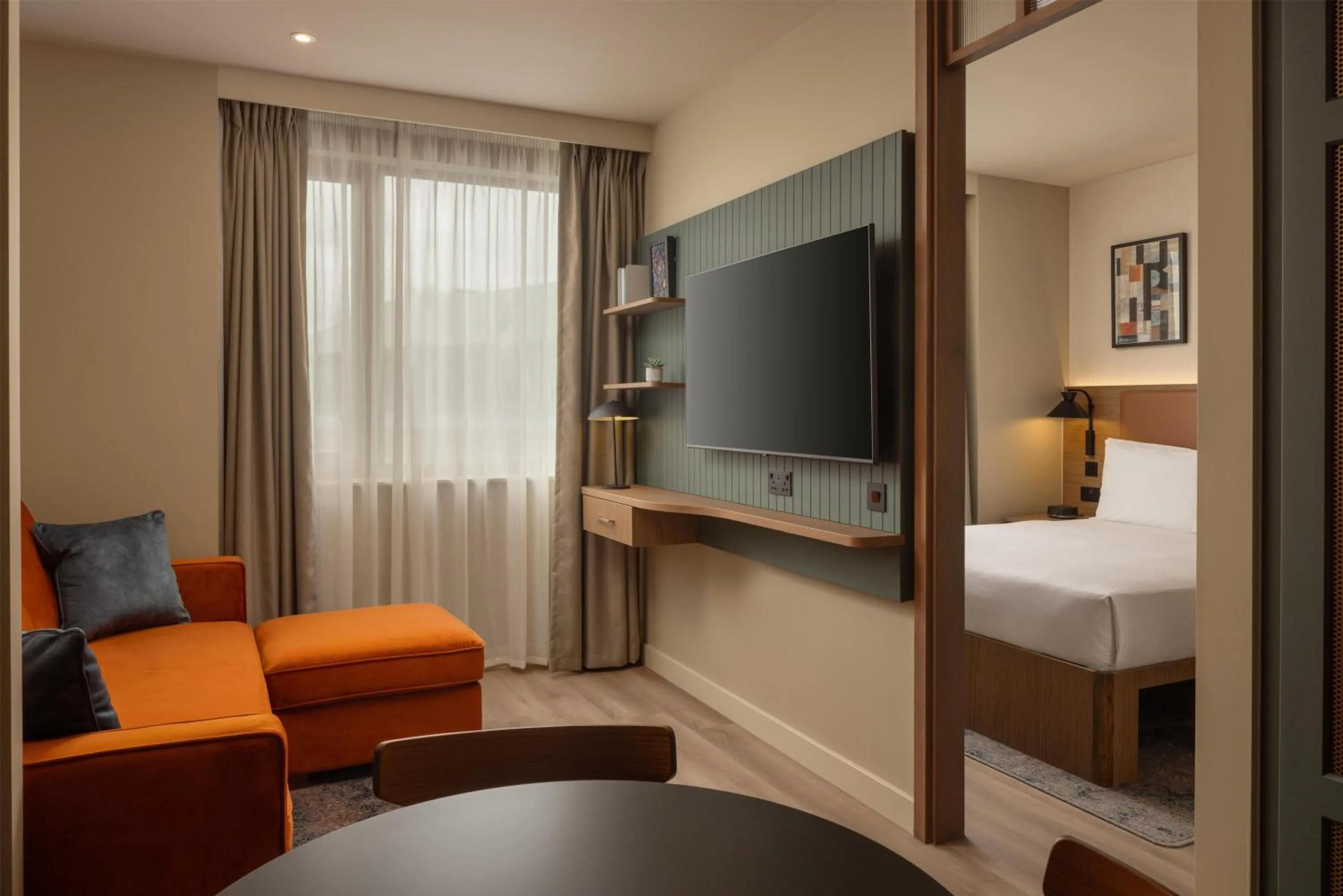 Living room, Bed in Home2 Suites By Hilton Dublin City Centre