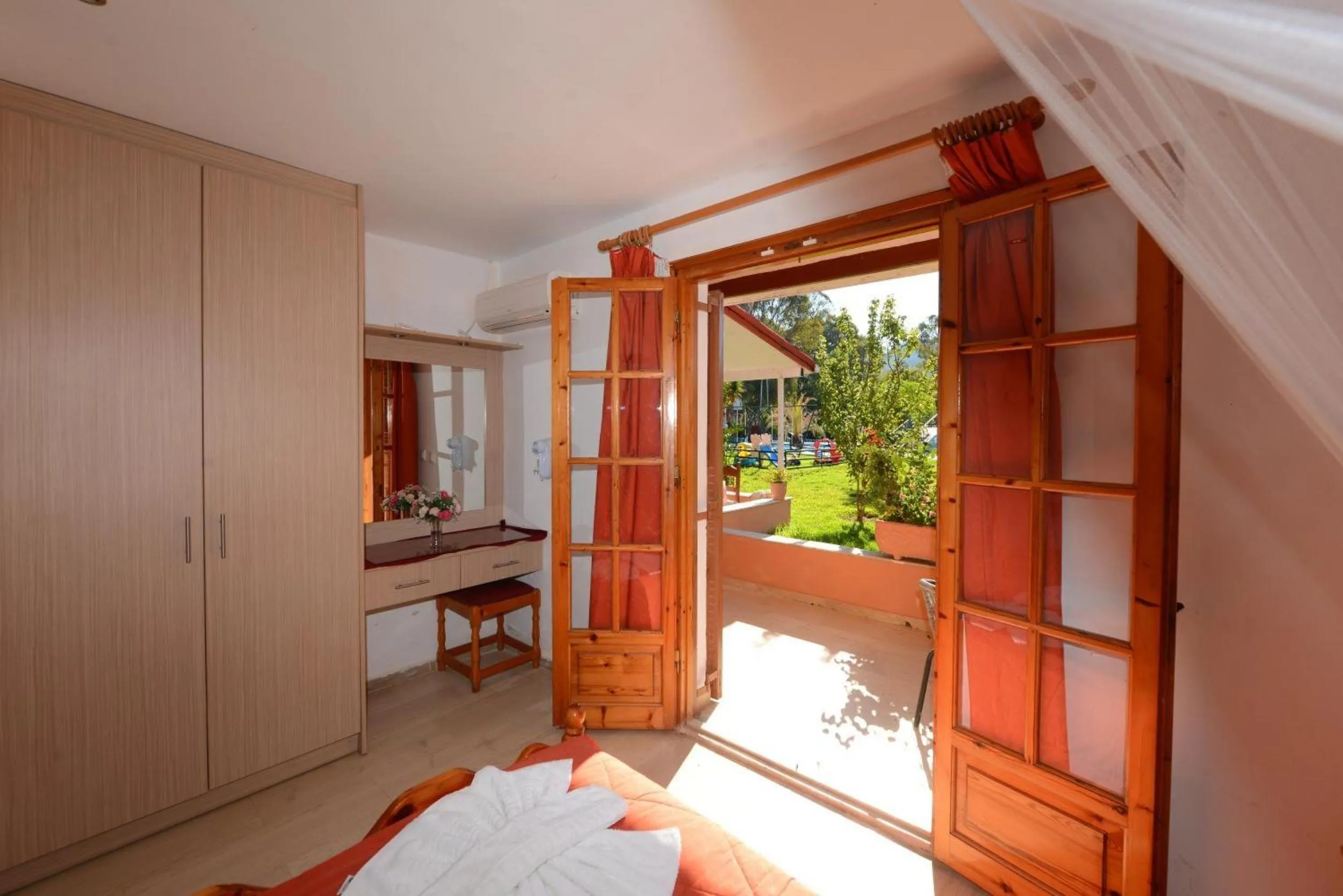 Property building, Bed in Charlies Venus Apartments