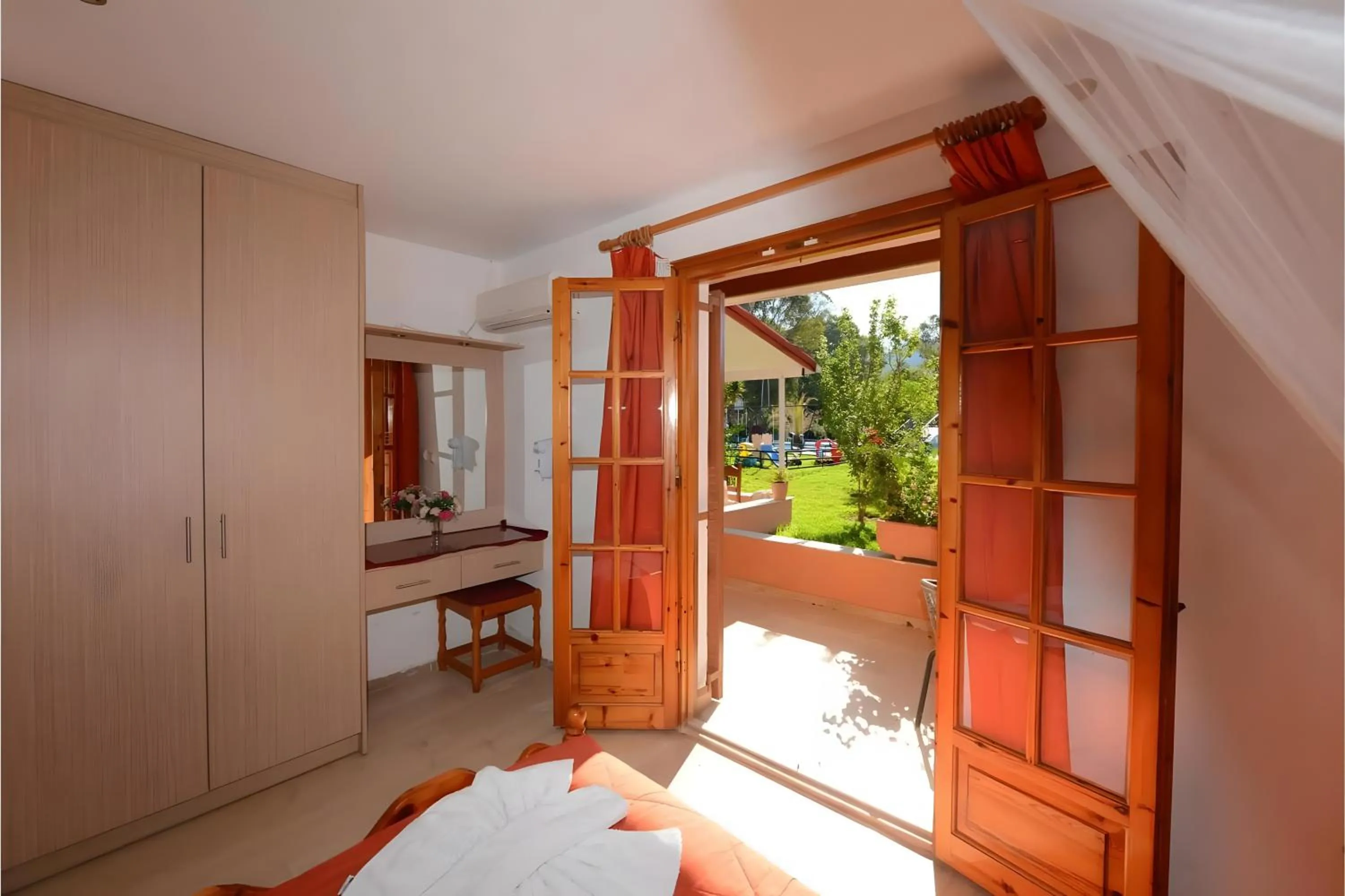 Property building, Bed in Charlies Venus Apartments