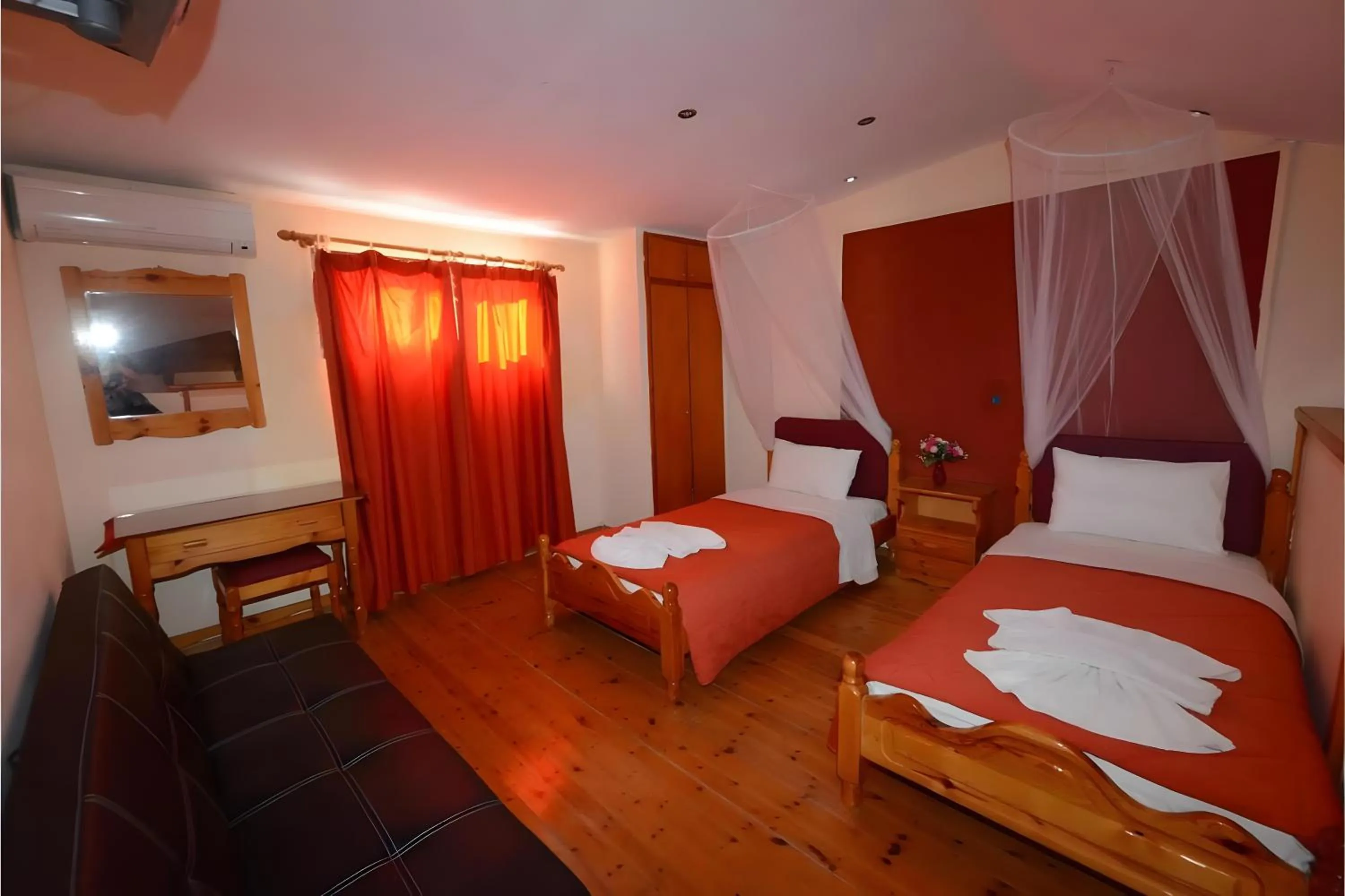 Property building, Bed in Charlies Venus Apartments