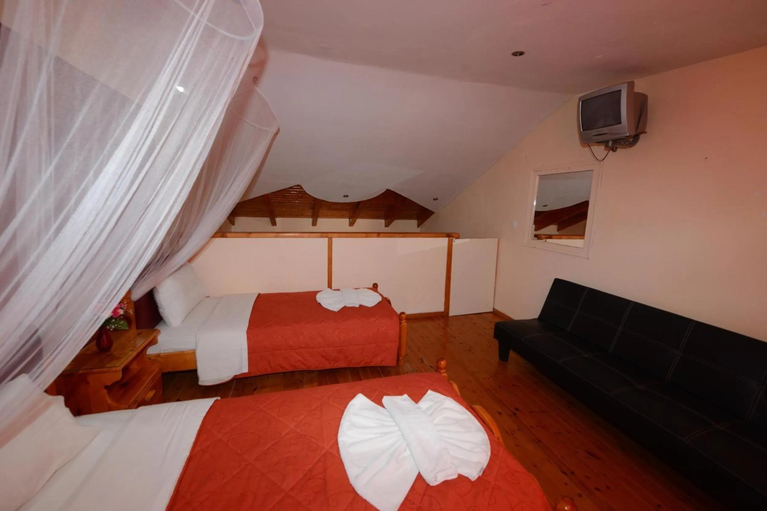 Property building, Bed in Charlies Venus Apartments