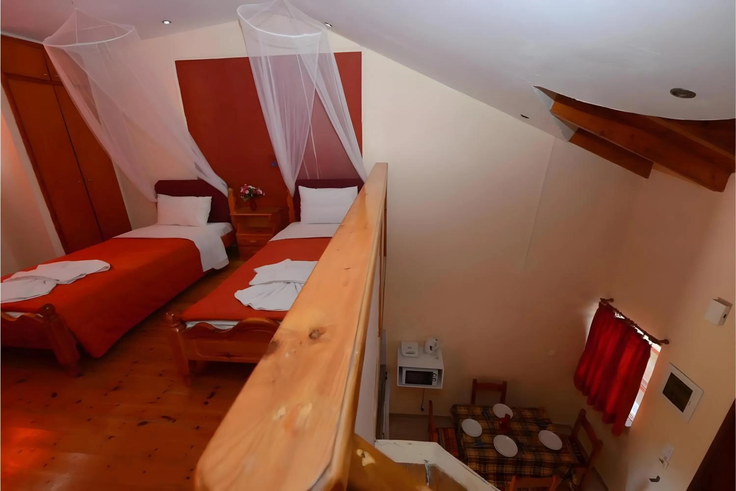 Property building, Bed in Charlies Venus Apartments