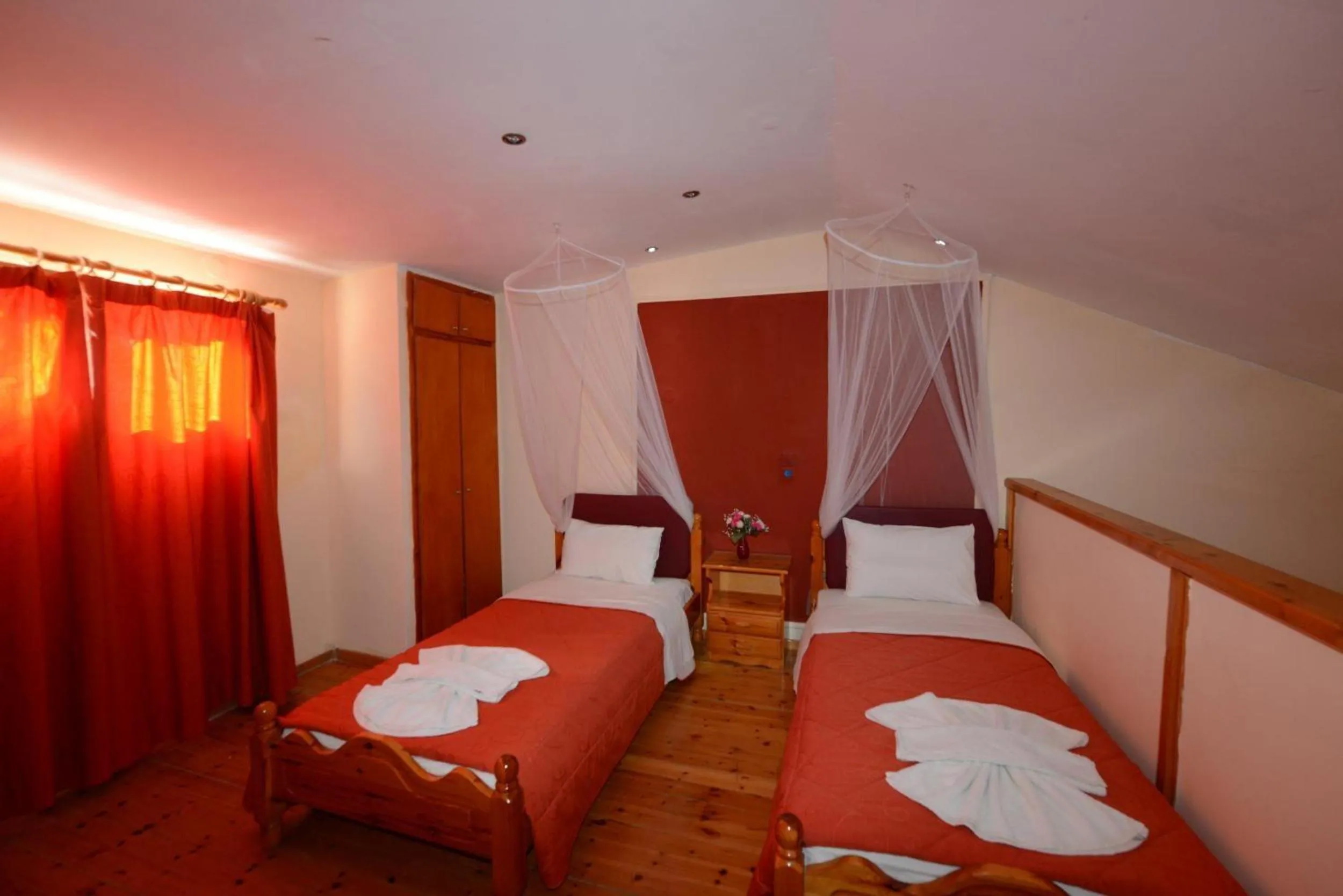 Property building, Bed in Charlies Venus Apartments