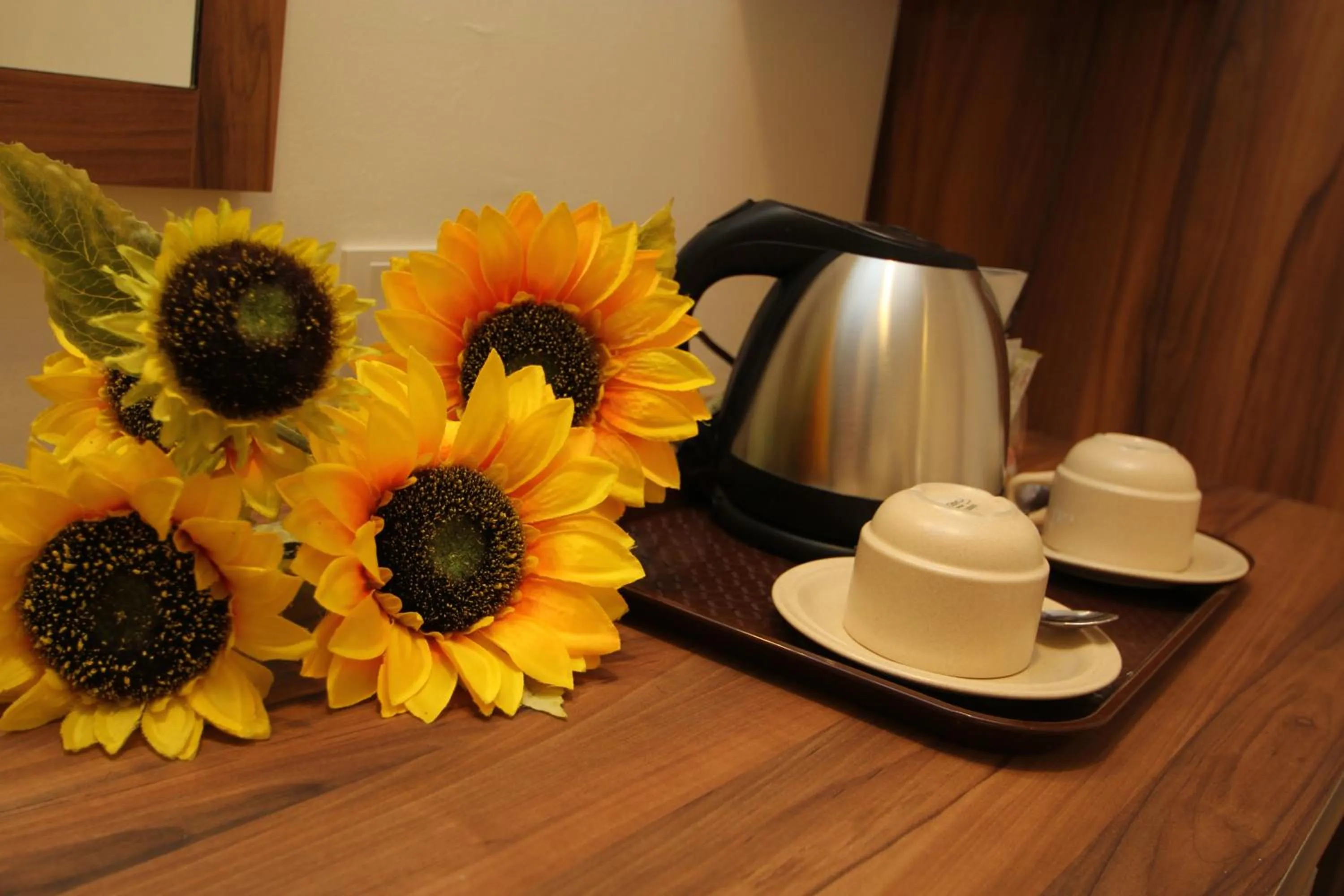 Coffee/tea facilities in Century Inn Hotel