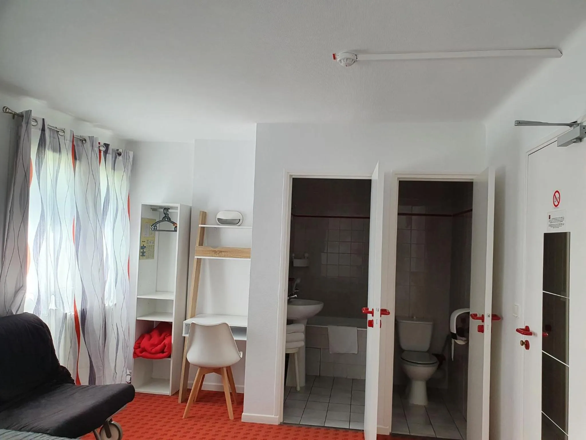 Bedroom in Hotel De La Poste