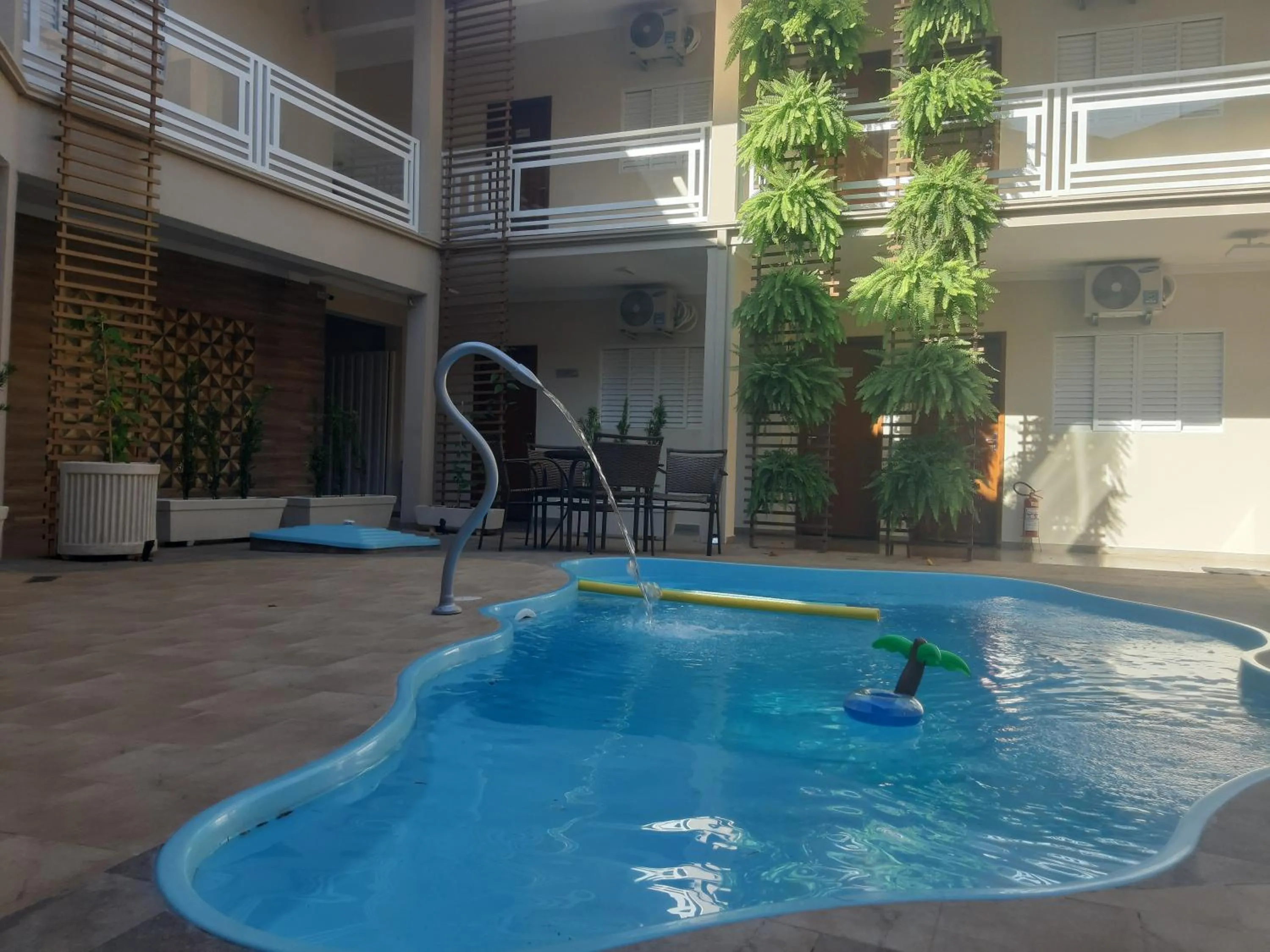 Swimming pool in Casagrande Olímpia Hotel