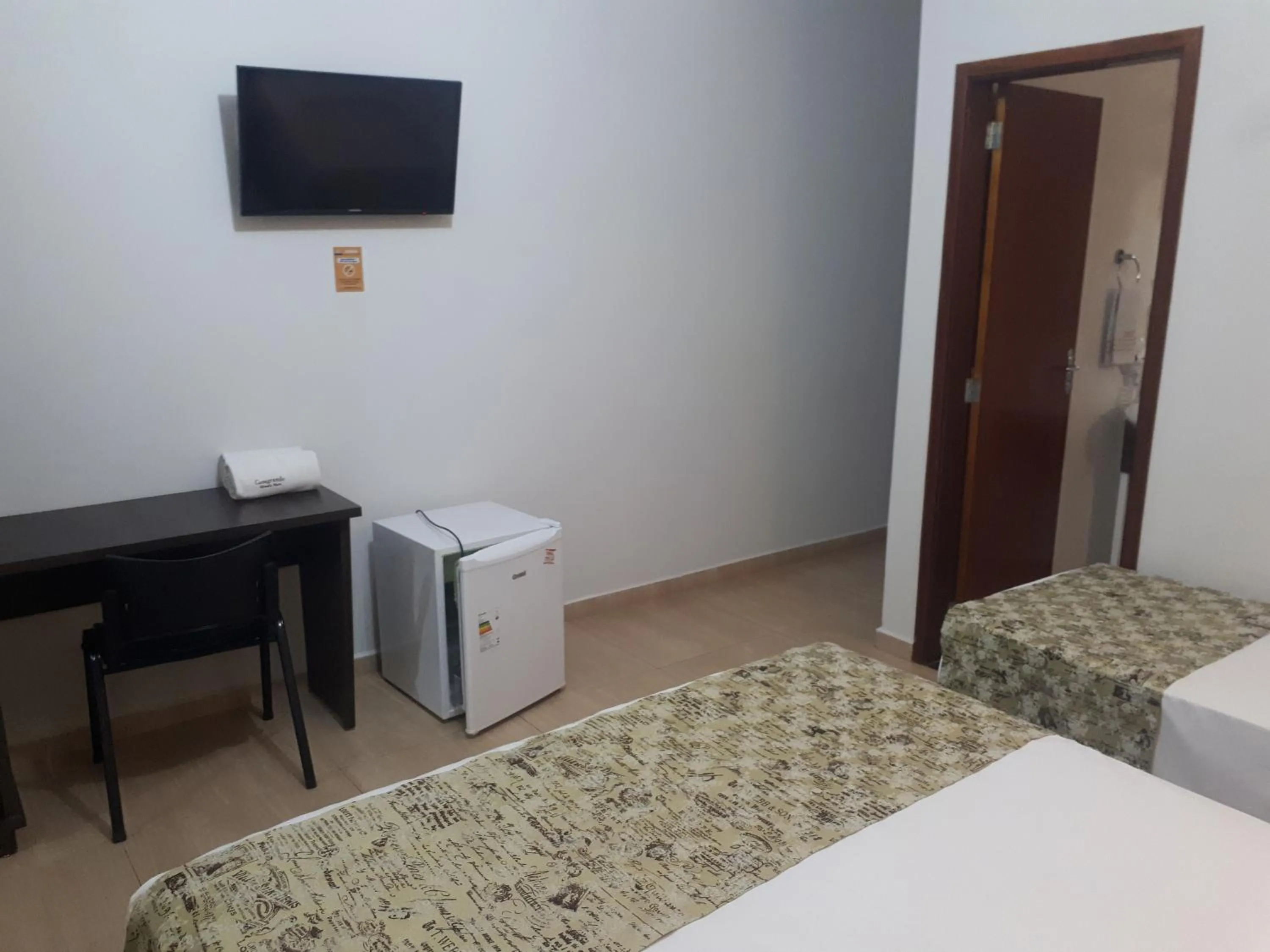 Photo of the whole room, Bed in Casagrande Olímpia Hotel