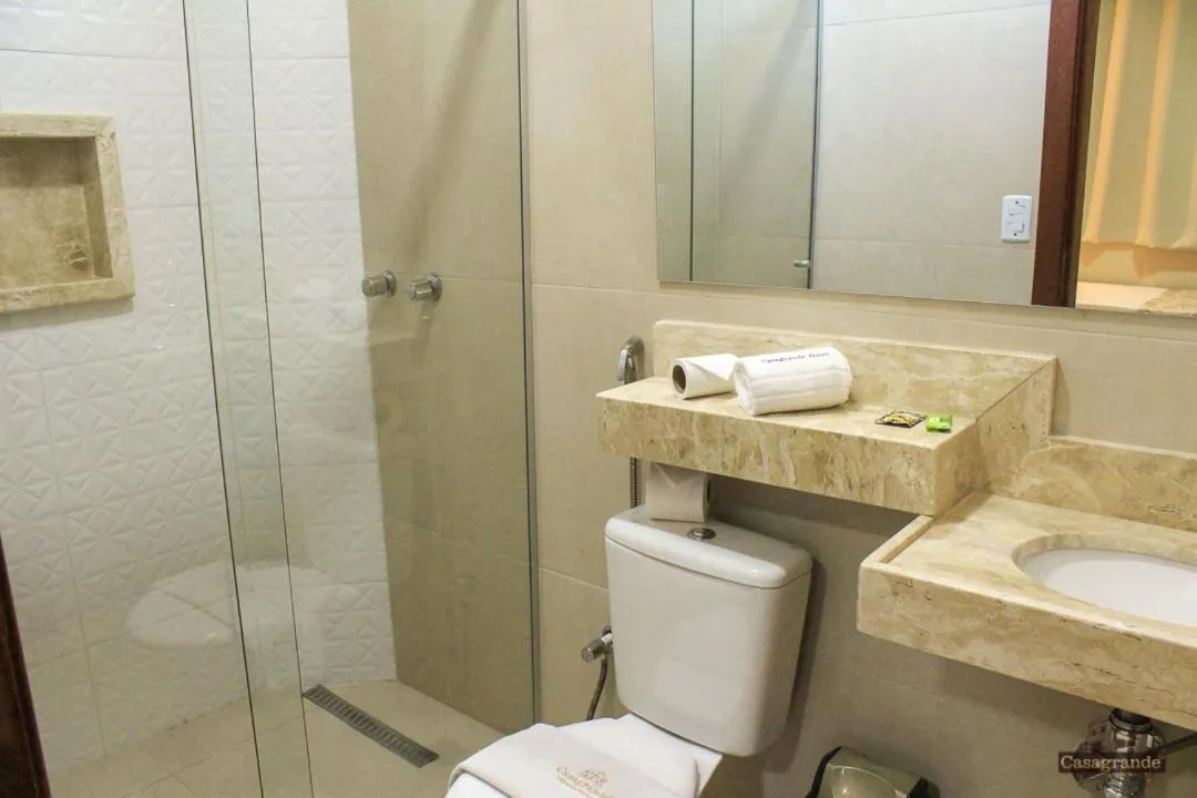 Bathroom in Casagrande Olímpia Hotel