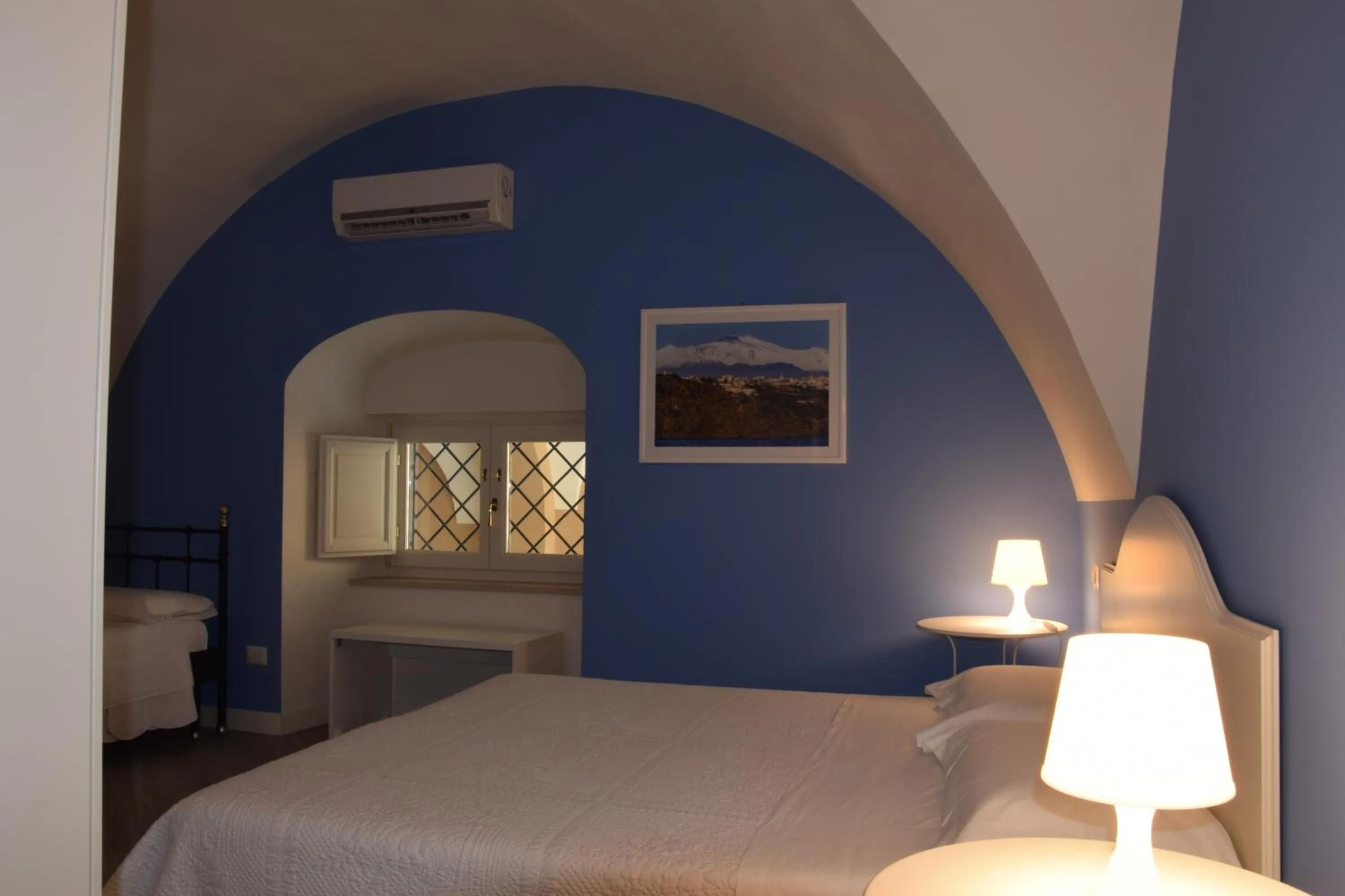 Photo of the whole room, Bed in Residenza Cavour