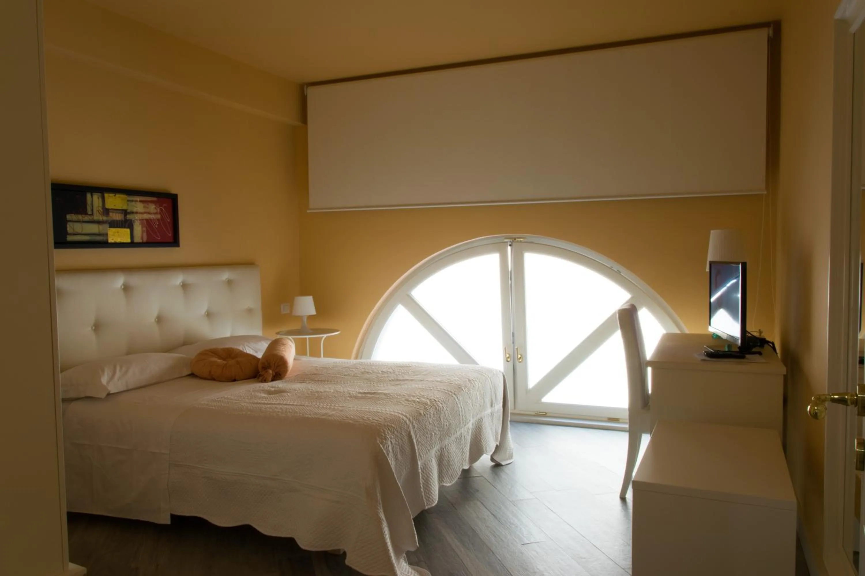 Photo of the whole room, Bed in Residenza Cavour