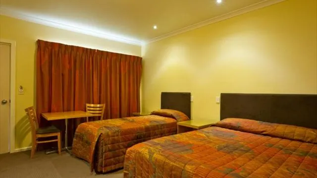 Bed in Motel Le Grande