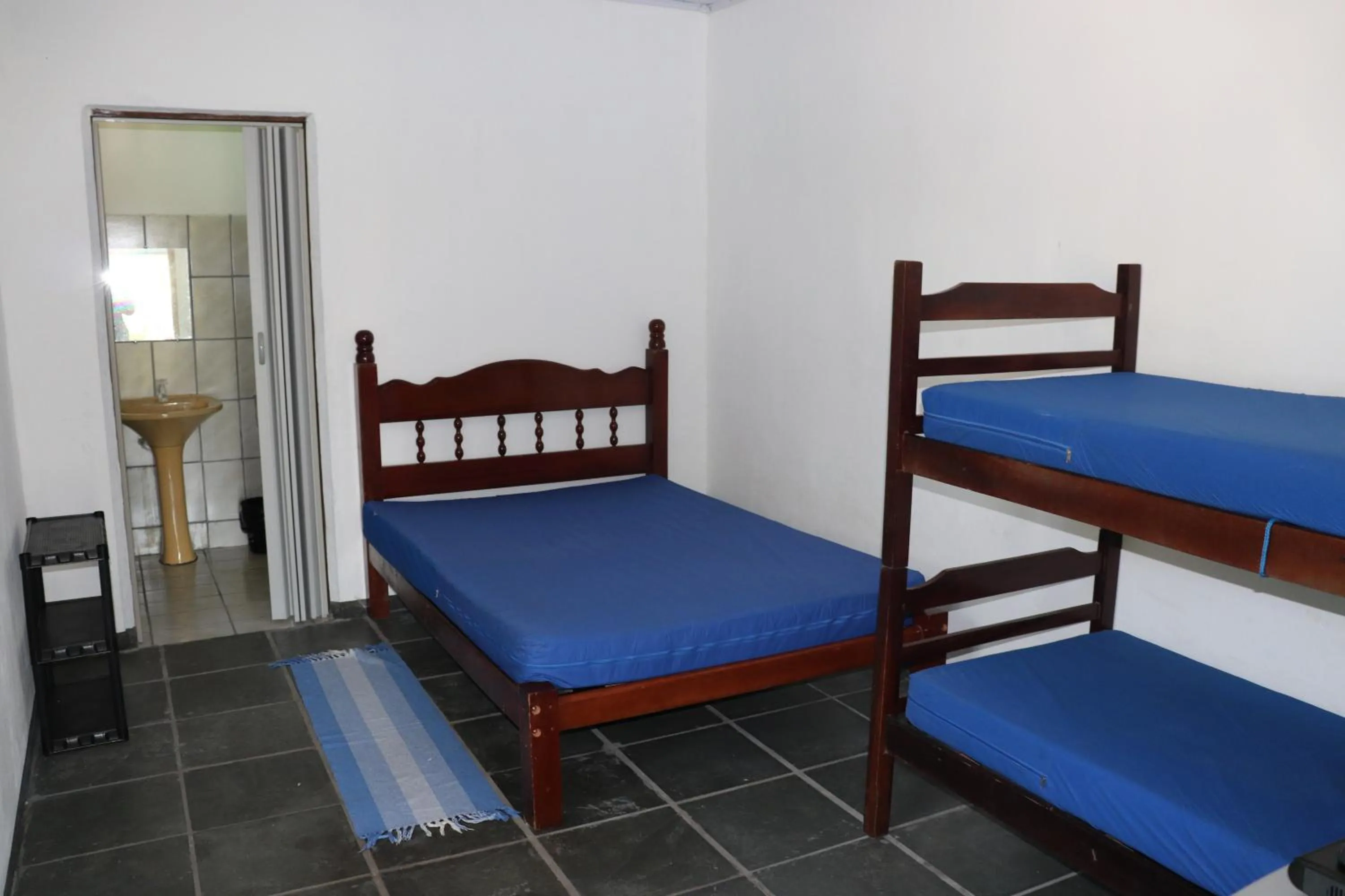Bed in Nosso Chalé na Ilha