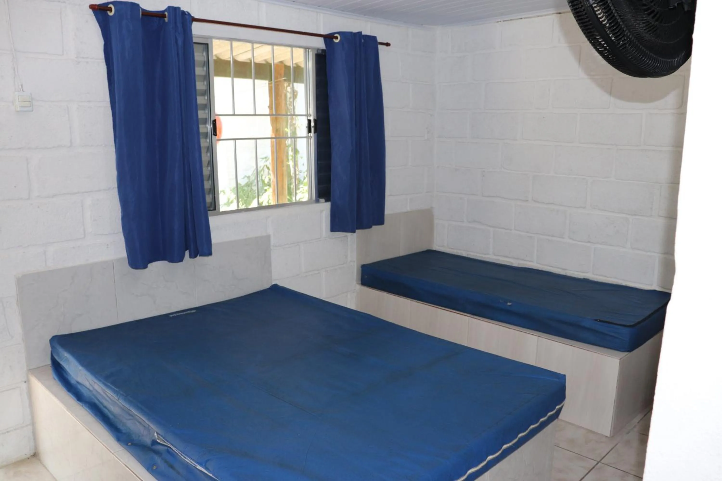 Bed in Nosso Chalé na Ilha