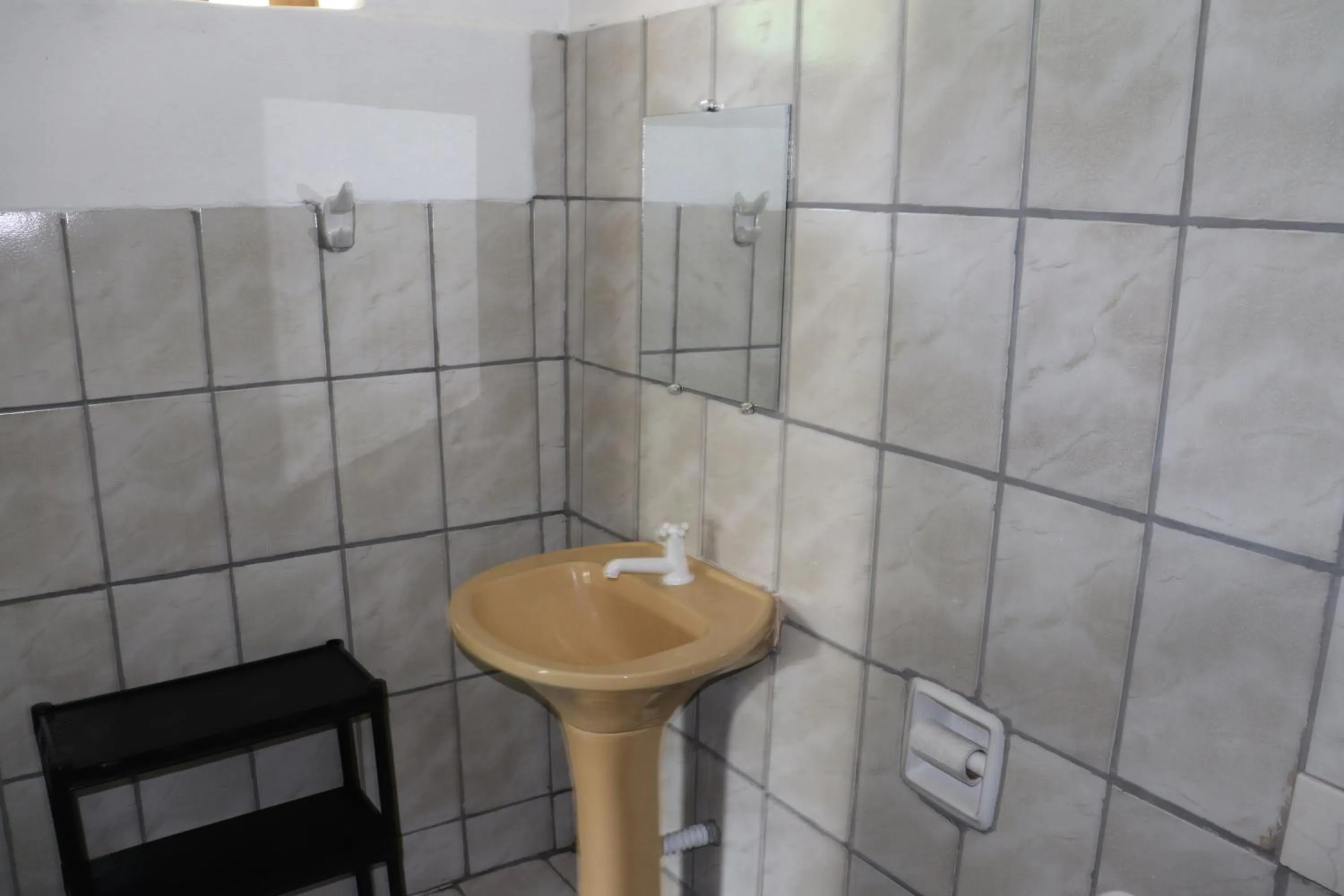 Bathroom in Nosso Chalé na Ilha