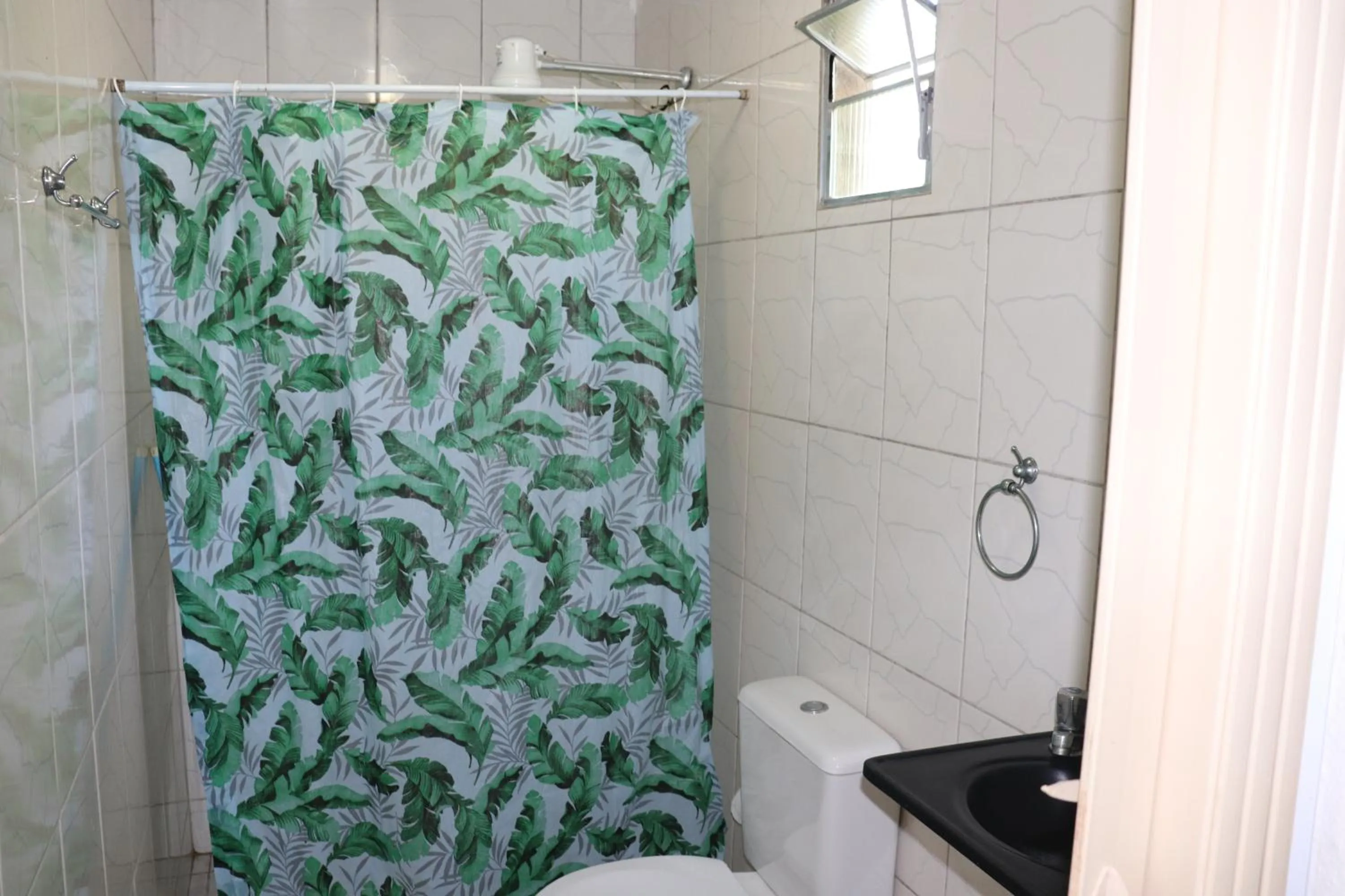 Bathroom in Nosso Chalé na Ilha