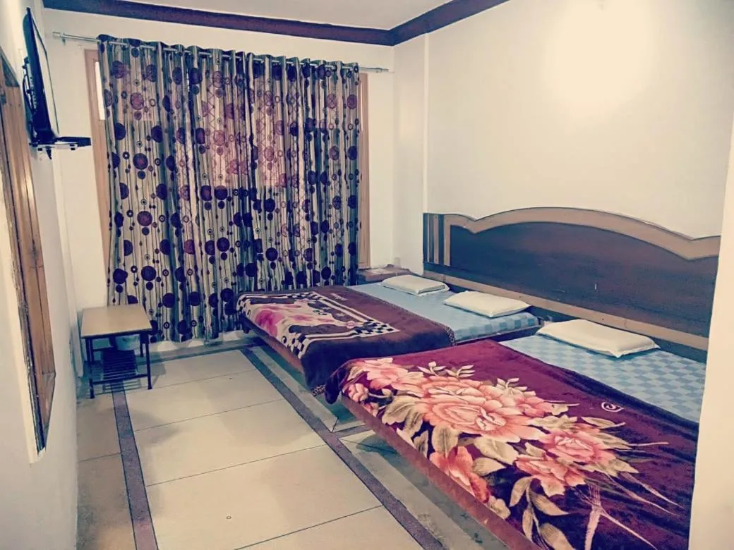 Bed in Hotel Kanshi Vishwa Nath