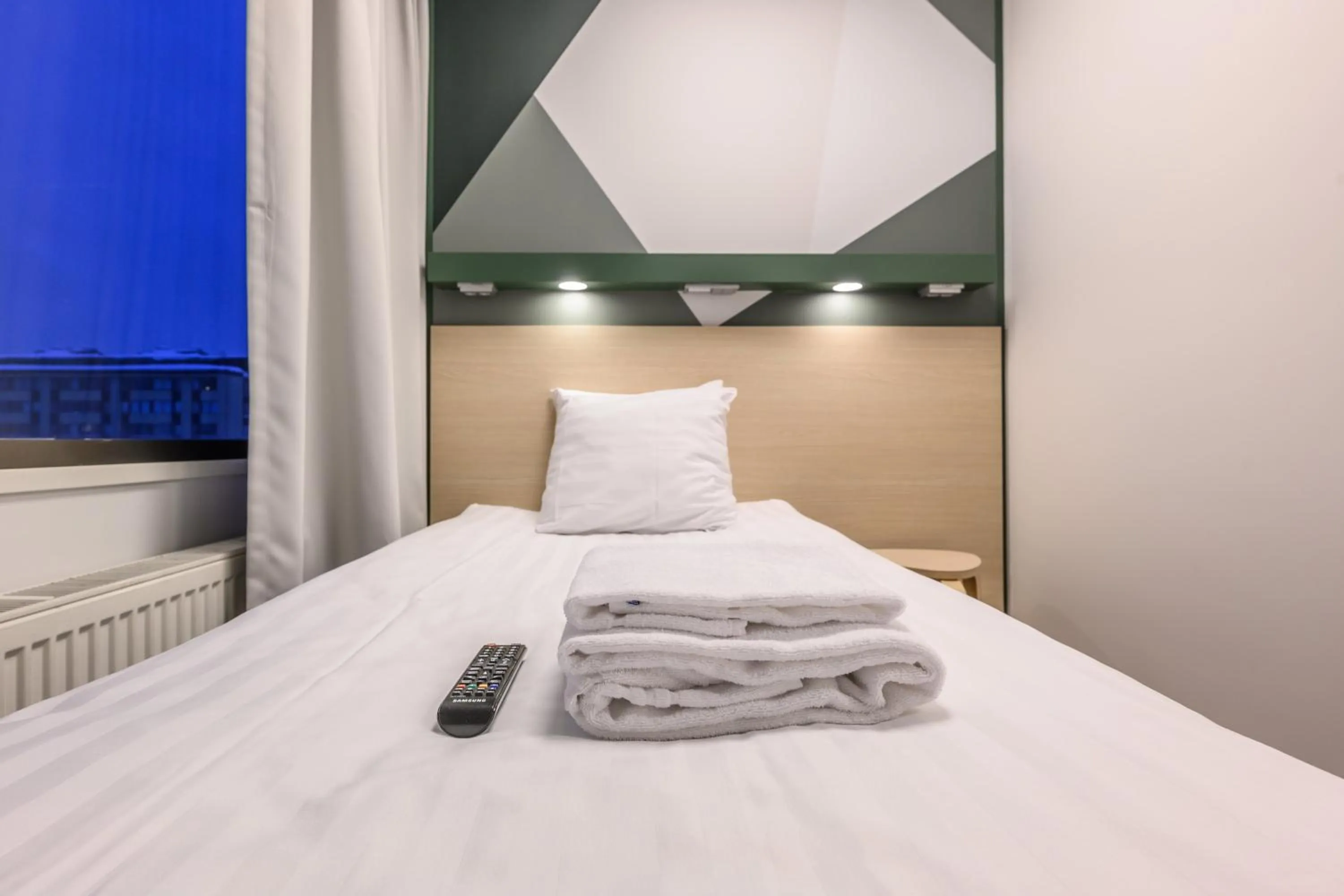 Bed in GreenStar Hotel Oulu