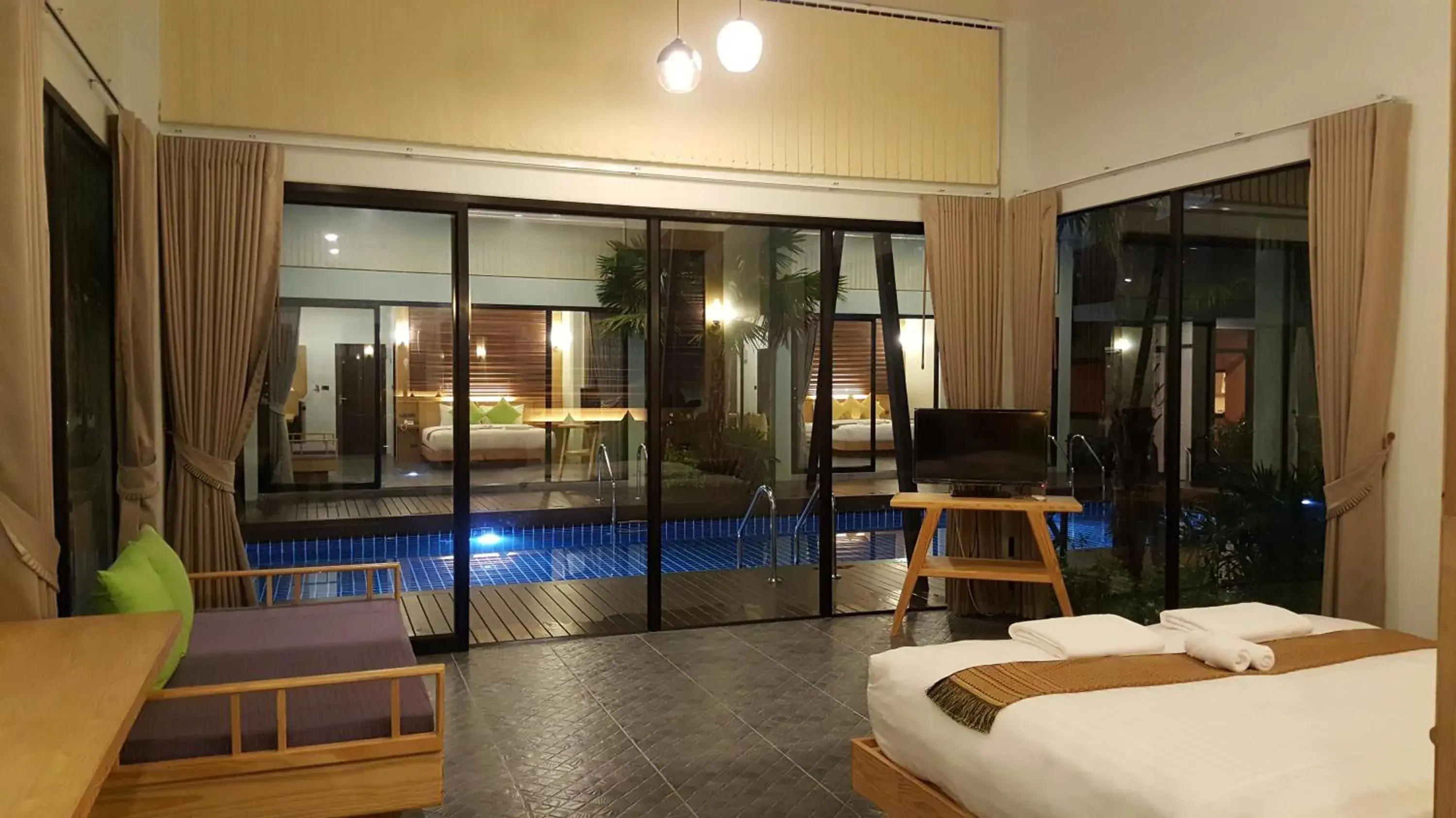 Pool view, Bed in Jasmine Resort And Spa Pool view, Bed in Jasmine Resort And Spa